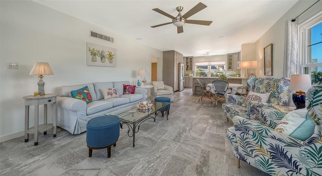 4440 Exeter Drive, Unit 301 Longboat Key, FL 34228 - Photo 4 of 72 a living room with furniture