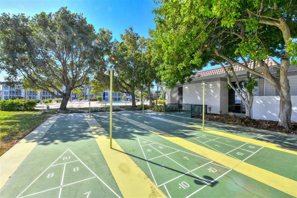 4440 Exeter Drive, Unit 301 Longboat Key, FL 34228 - Photo 55 of 72 a view of a tennis court