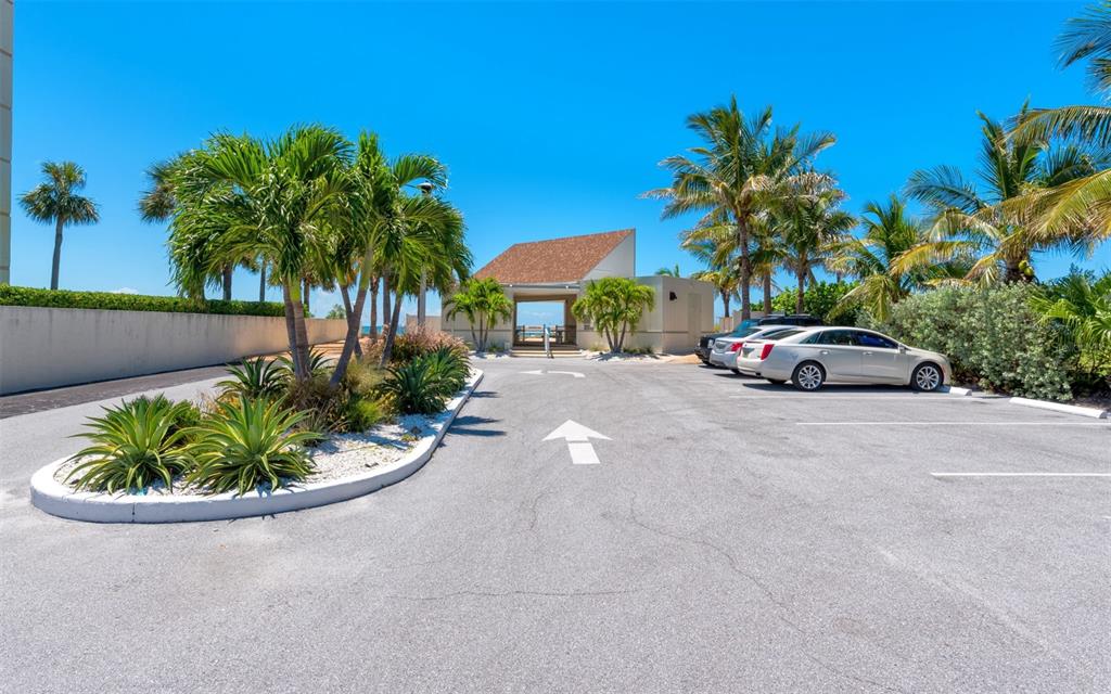 4440 Exeter Drive, Unit 301 Longboat Key, FL 34228 - Photo 64 of 72 a car parked on the side of the road