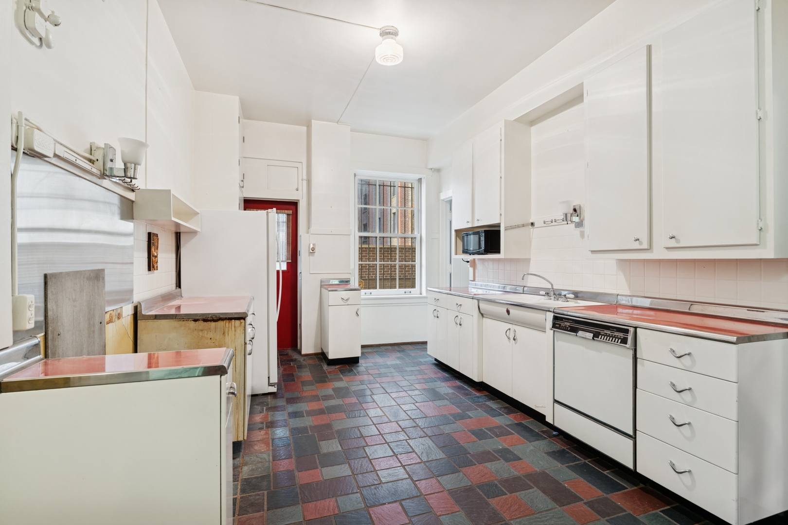 200 East Pearson Street, Unit 2E Chicago, IL 60611 - Photo 16 of 25 a kitchen with stainless steel appliances granite countertop a stove and a sink