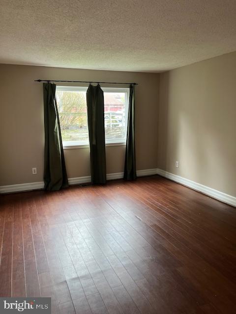 511 Chanticleer Cherry Hill, NJ 08003 - Photo 12 of 32 an empty room with wooden floor and windows