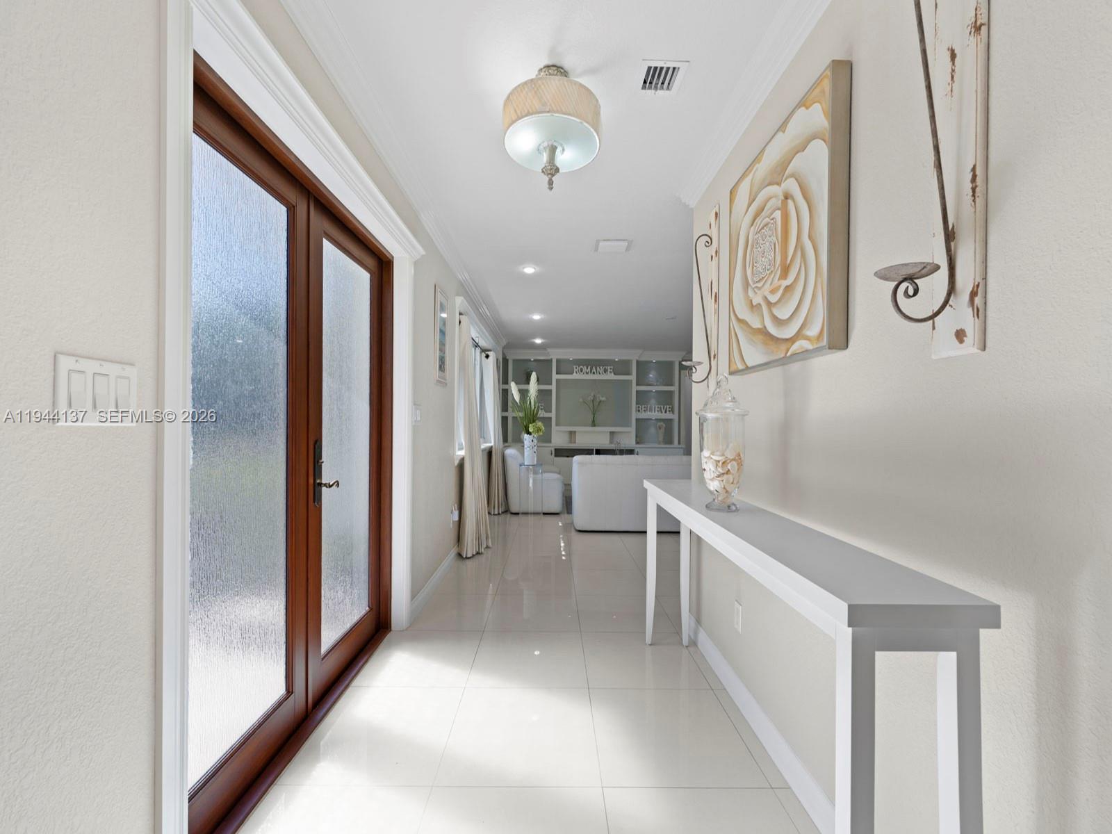 8205 Southwest 116th Street Miami, FL 33156 - Photo 2 of 32 Foyer to Family