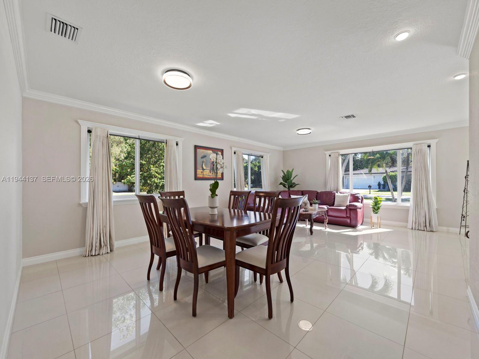 8205 Southwest 116th Street Miami, FL 33156 - Photo 9 of 32 Dining/Living