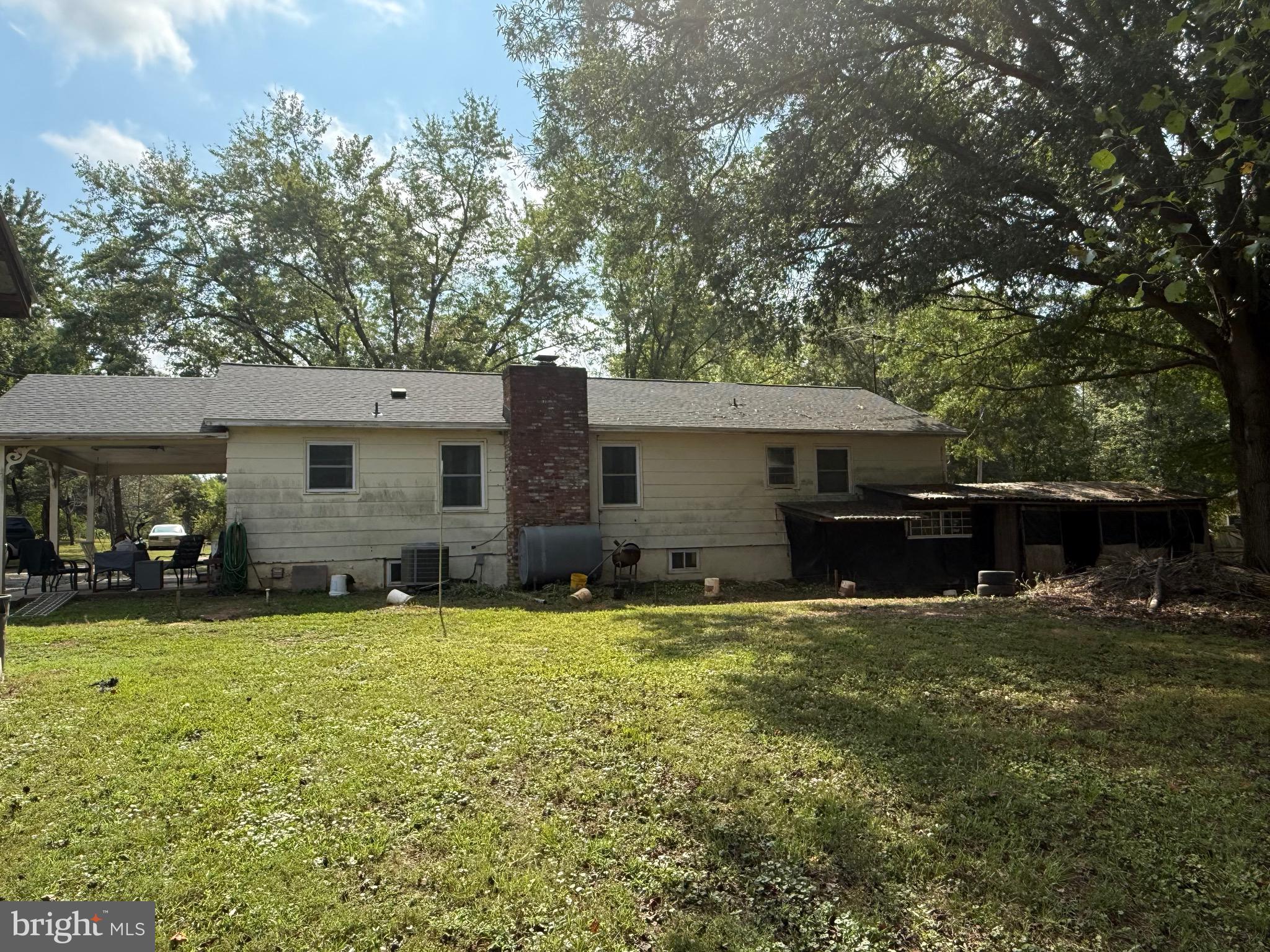 12400 Orchard Street Locust Grove, VA 22508 - Photo 3 of 13 a view of a house with a yard and sitting area