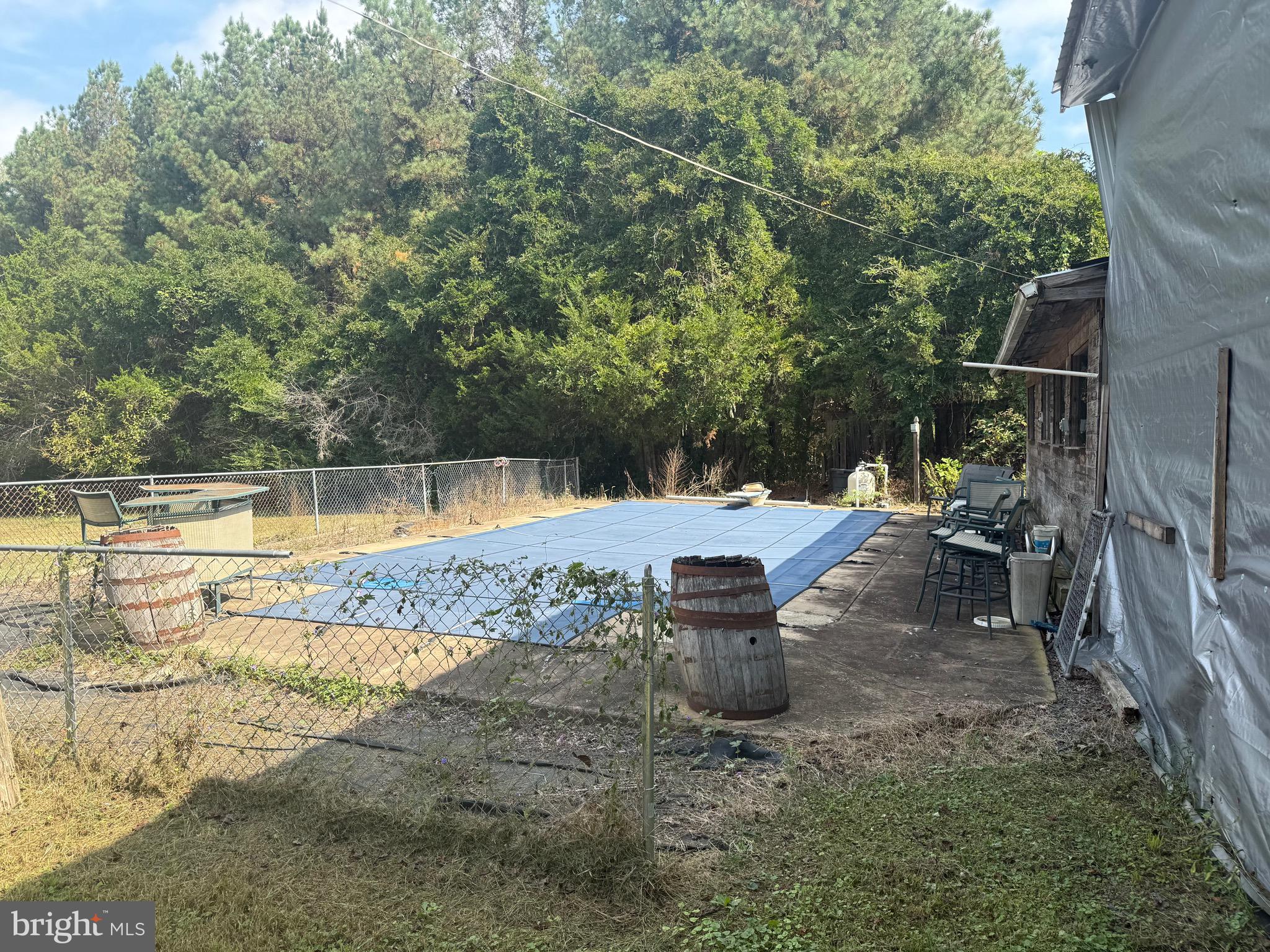 12400 Orchard Street Locust Grove, VA 22508 - Photo 5 of 13 a view of a swimming pool with a patio