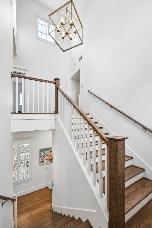3535 Michaux Street Houston, TX 77009 - Photo 22 of 48 This modern chandelier anchors generous space in the stairwell.