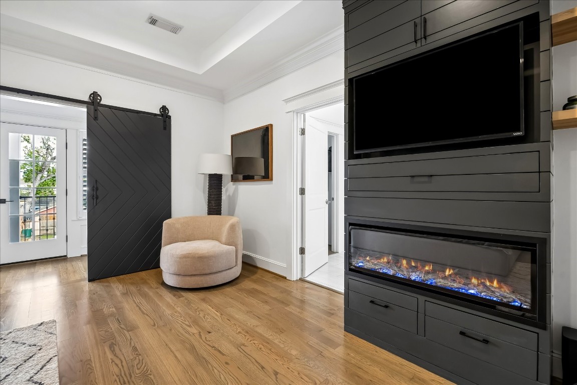 3535 Michaux Street Houston, TX 77009 - Photo 25 of 48 Notice how well the electric fireplace blends into the custom drawers and cabinetry.