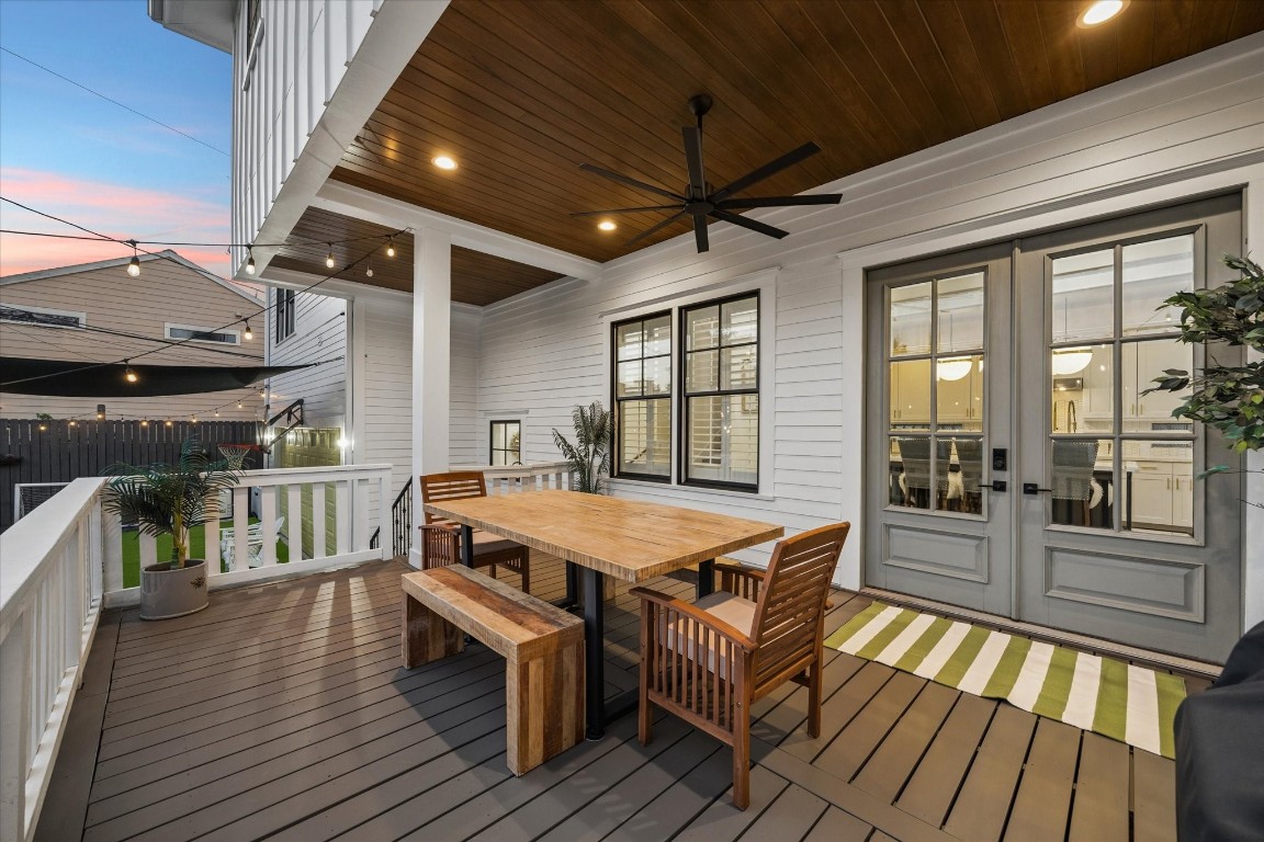 3535 Michaux Street Houston, TX 77009 - Photo 39 of 48 Yet another example of gracious outdoor living, this space flows seamlessly through French doors to the kitchen. A ceiling fan will keep you cool, and the overhang will protect you from sunrays.