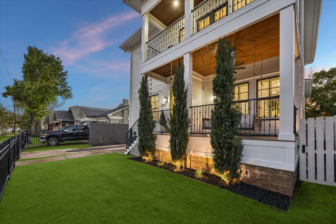 3535 Michaux Street Houston, TX 77009 - Photo 6 of 48 Love a beautiful yard but short on time? This front area features the same turf carpet perfect for pets and easy to clean, plus beautiful landscaping and uplights that can be changed to any color and even timed to holiday music.
