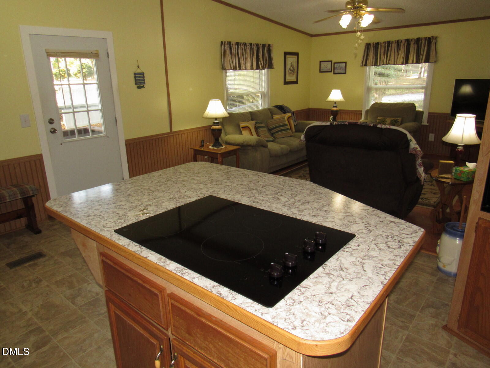 34 Waters Edge Cove Henderson, NC 27537 - Photo 15 of 44 a kitchen with a stove and a refrigerator