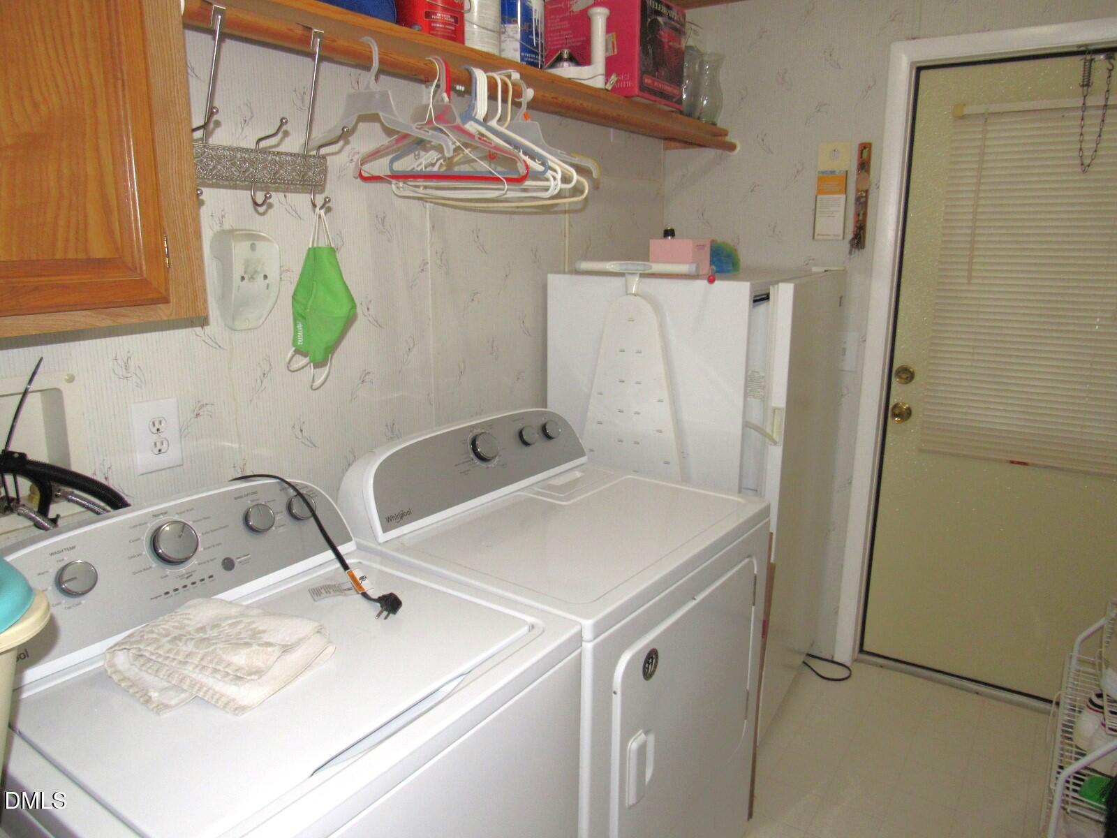 34 Waters Edge Cove Henderson, NC 27537 - Photo 27 of 44 a utility room with dryer and washer