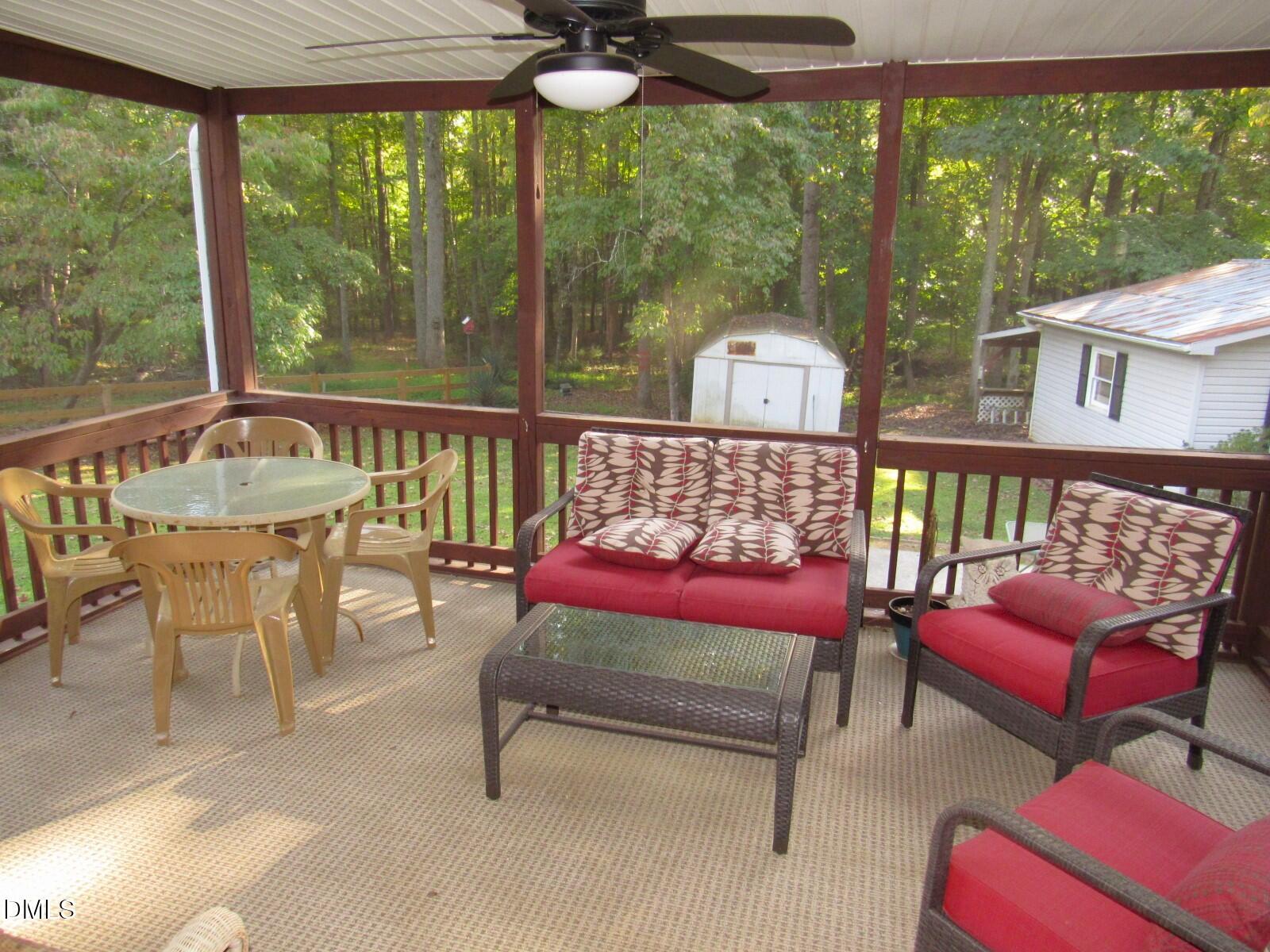 34 Waters Edge Cove Henderson, NC 27537 - Photo 29 of 44 a bedroom with furniture and a large window