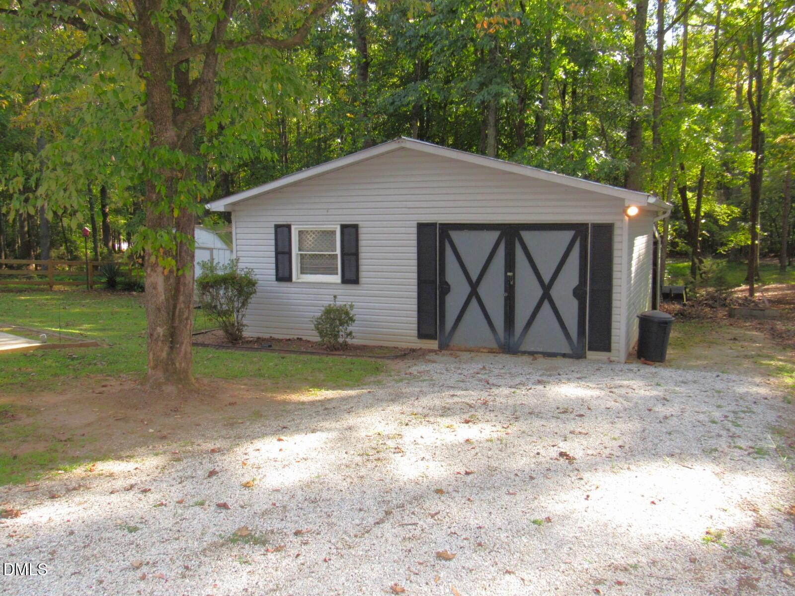 34 Waters Edge Cove Henderson, NC 27537 - Photo 32 of 44 a view of backyard of house