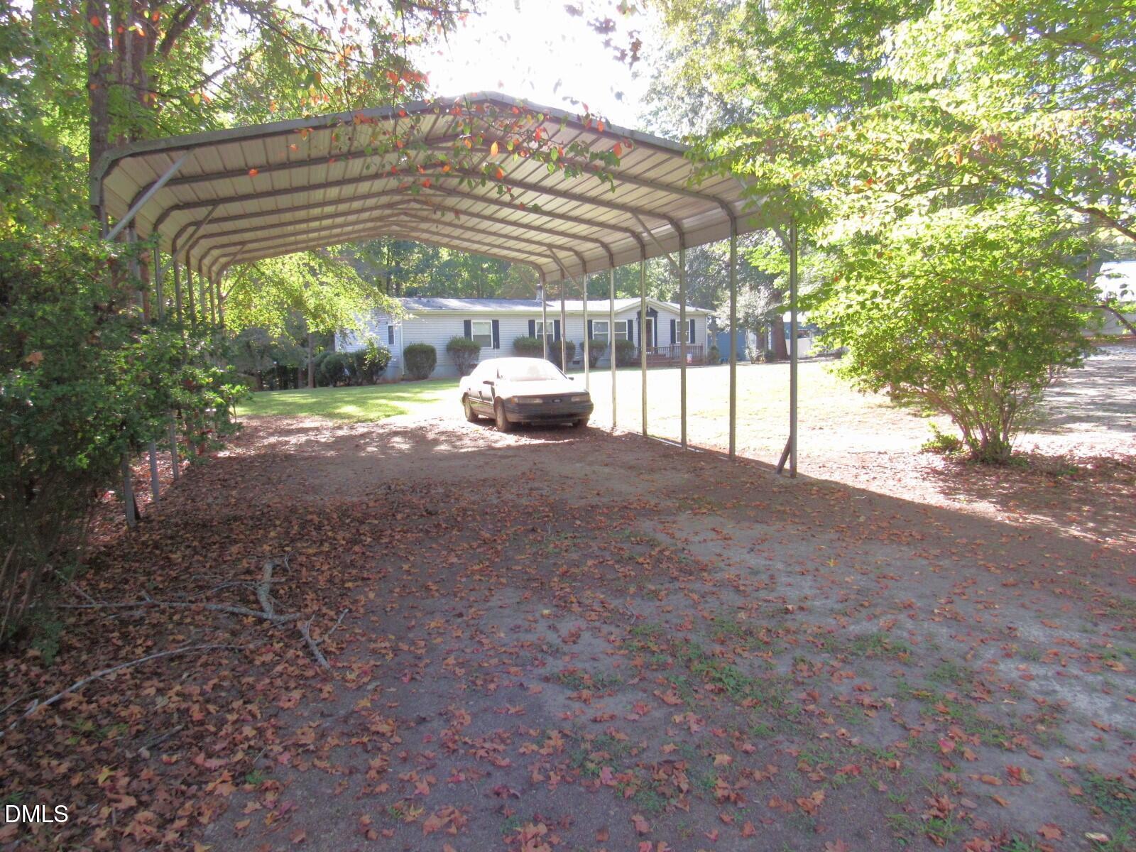 34 Waters Edge Cove Henderson, NC 27537 - Photo 34 of 44 a view of a yard with an outdoor space