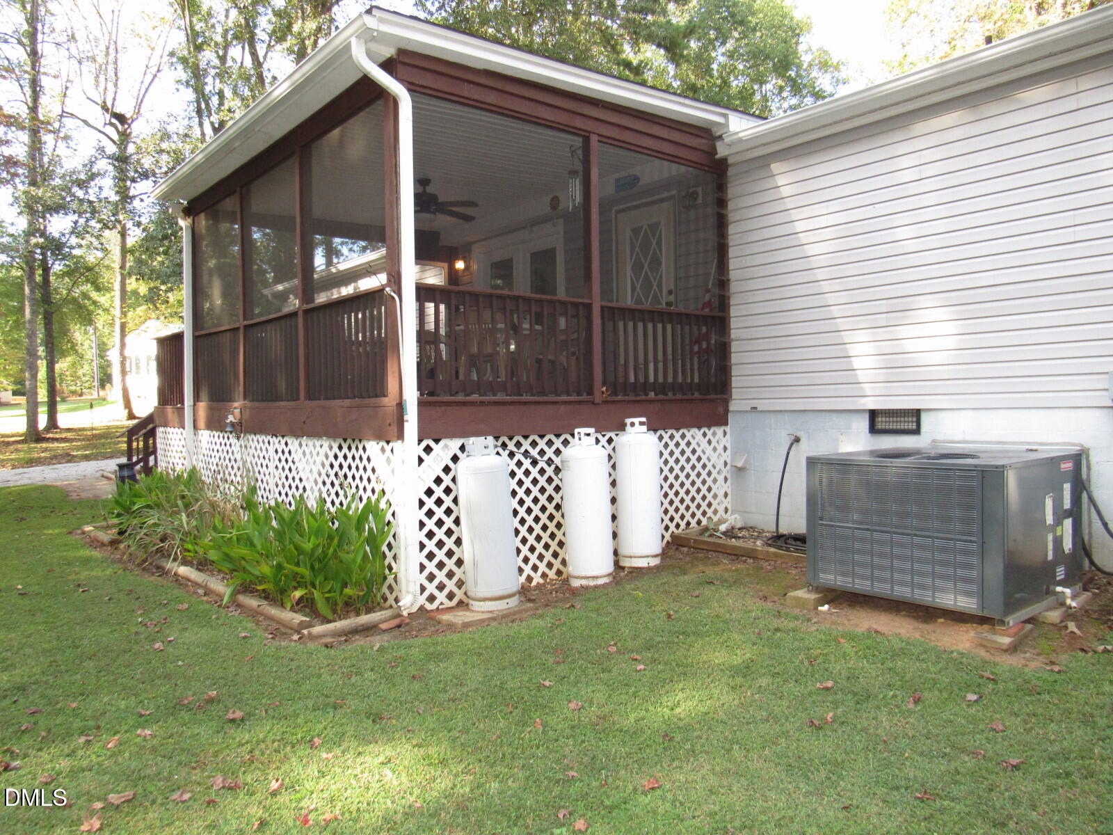 34 Waters Edge Cove Henderson, NC 27537 - Photo 35 of 44 a front view of a house with garden