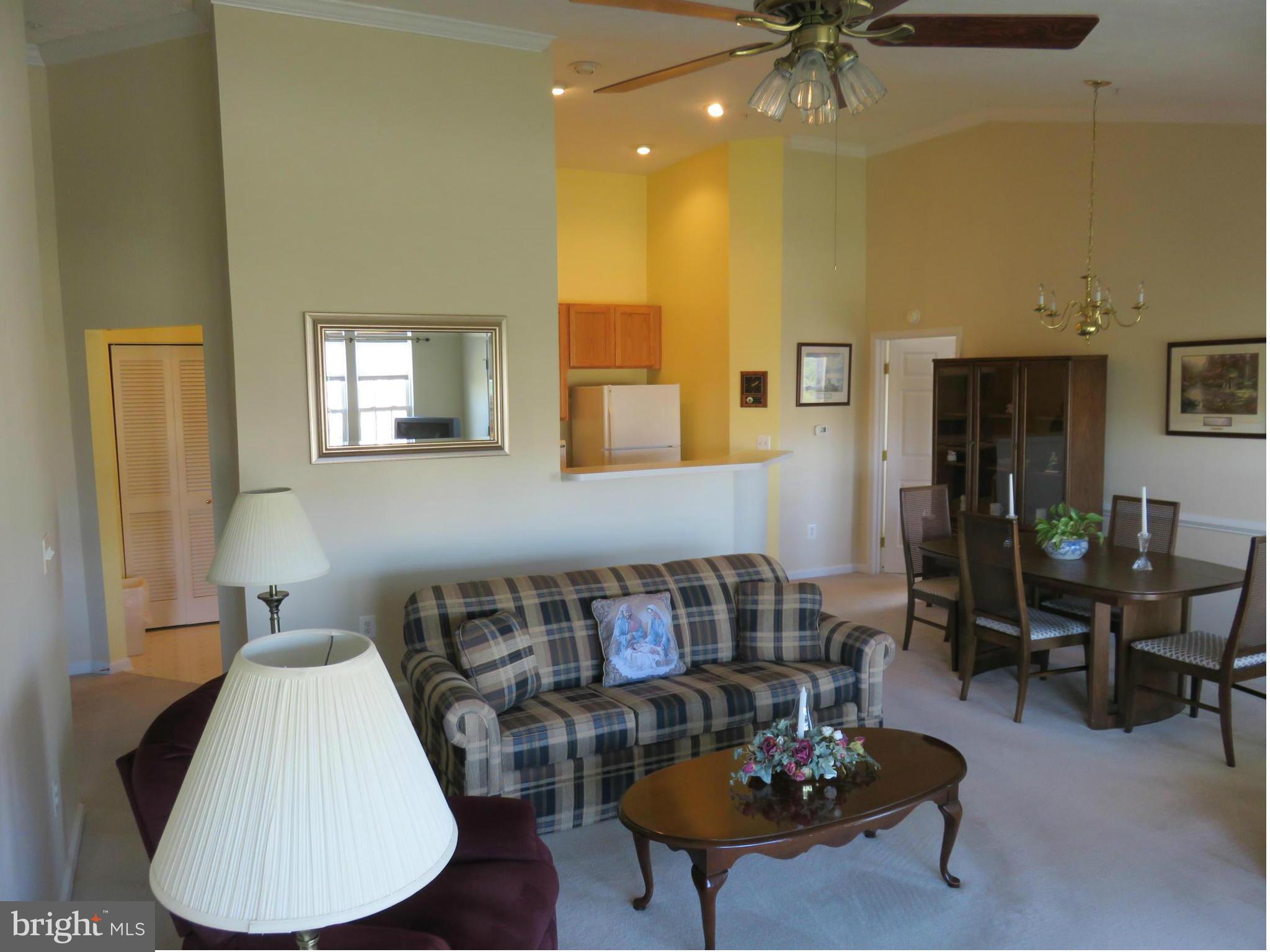 9604 Haven Farm Road, Unit K Perry Hall, MD 21128 - Photo 10 of 24 a living room with furniture and a wooden floor
