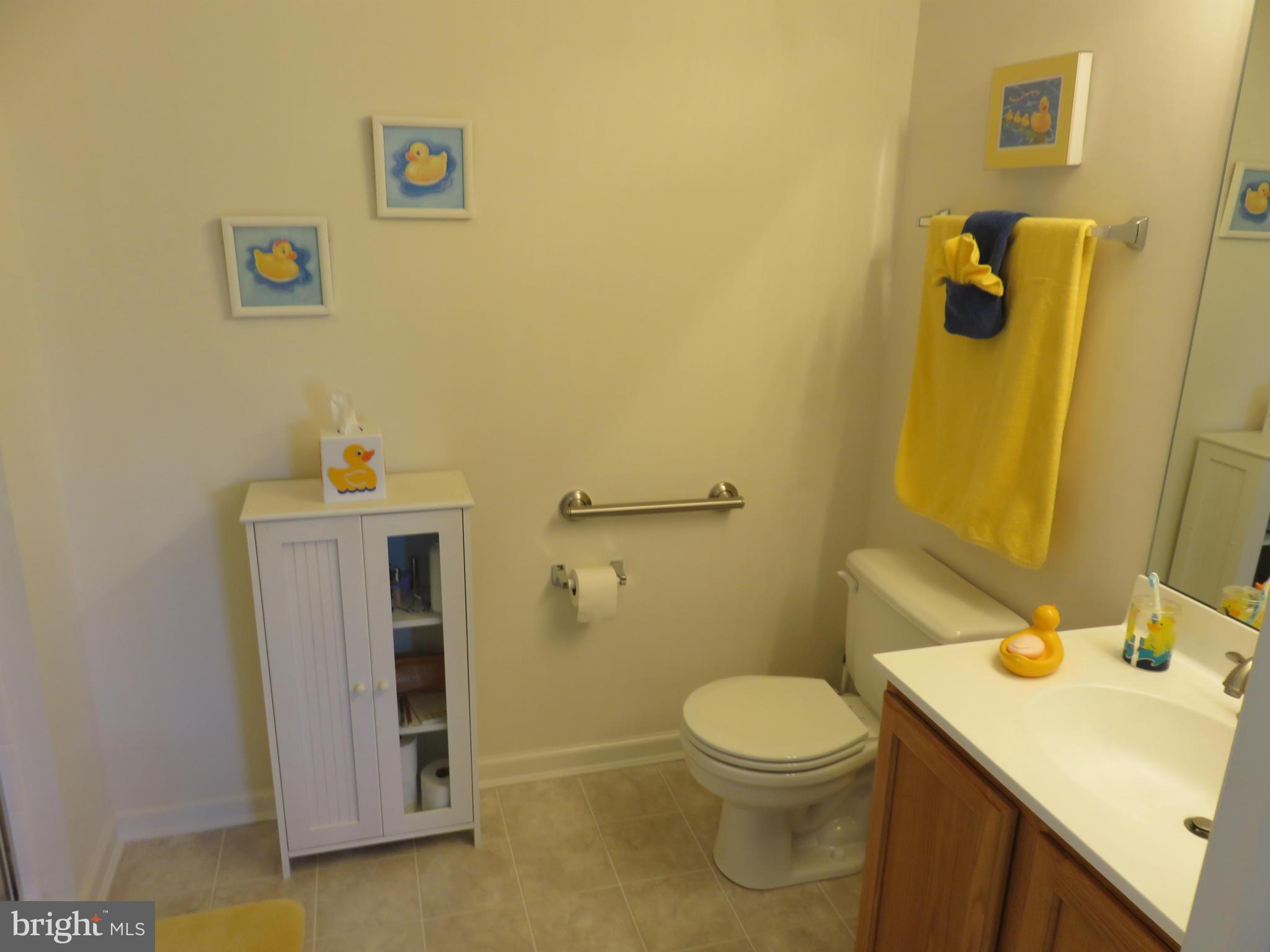9604 Haven Farm Road, Unit K Perry Hall, MD 21128 - Photo 15 of 24 a bathroom with a sink a toilet and shower