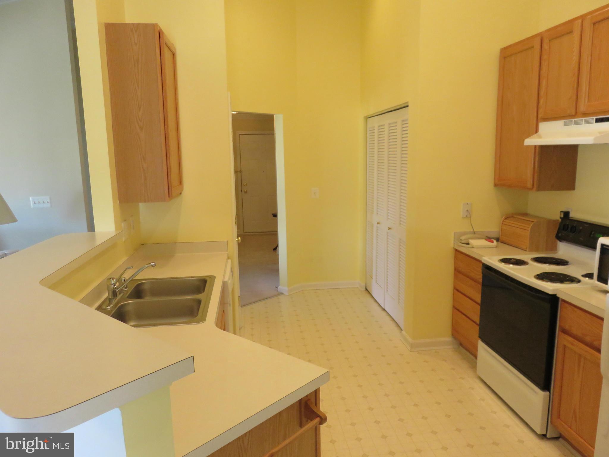 9604 Haven Farm Road, Unit K Perry Hall, MD 21128 - Photo 3 of 24 a bathroom with a tub sink and a mirror