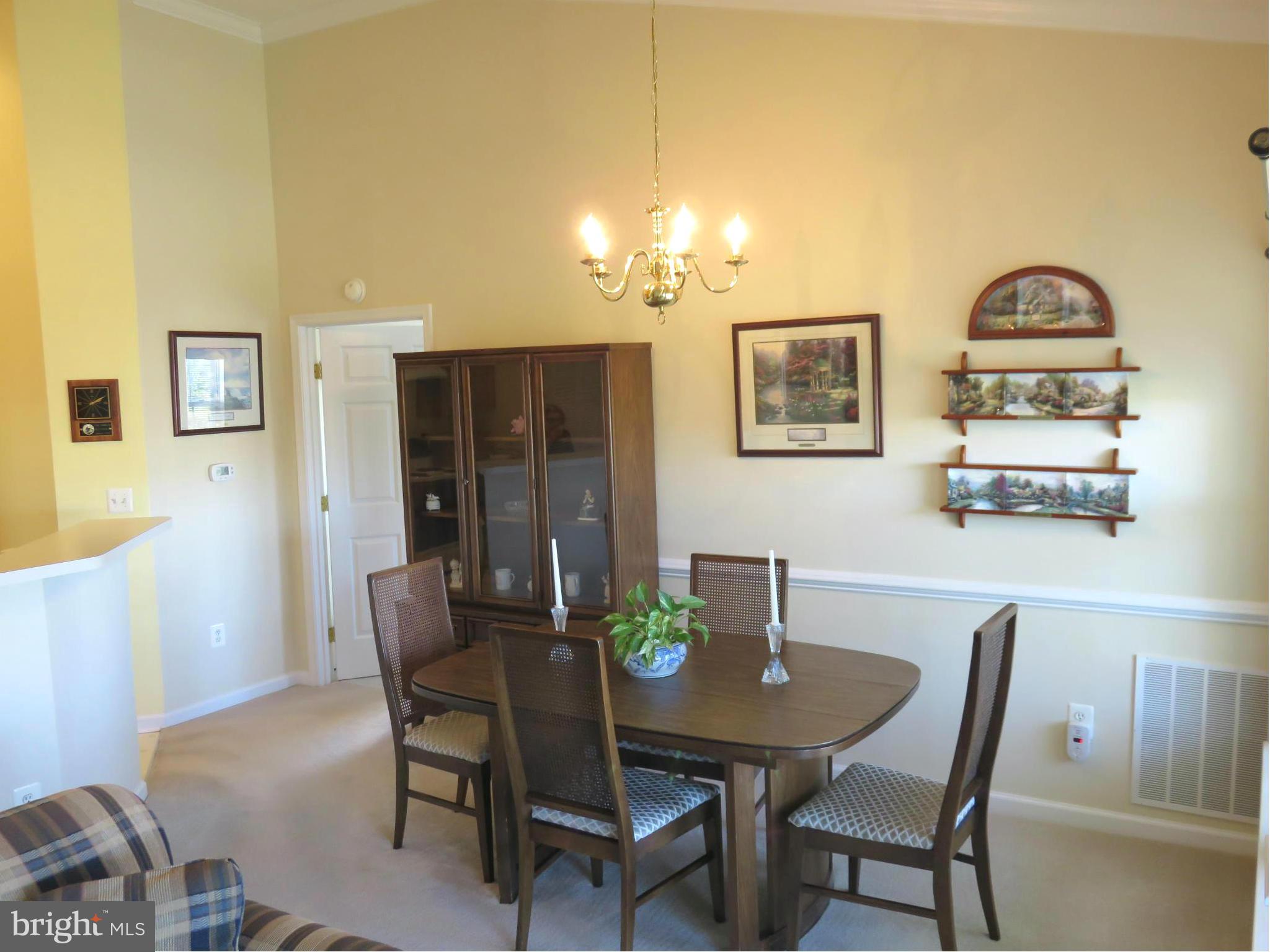 9604 Haven Farm Road, Unit K Perry Hall, MD 21128 - Photo 7 of 24 a view of a dining room with furniture