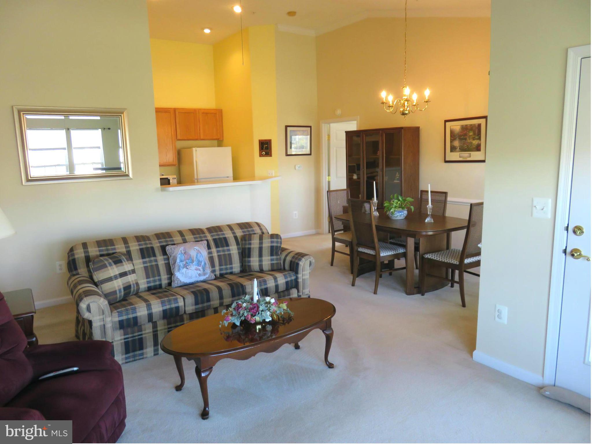 9604 Haven Farm Road, Unit K Perry Hall, MD 21128 - Photo 9 of 24 a living room with furniture and a table