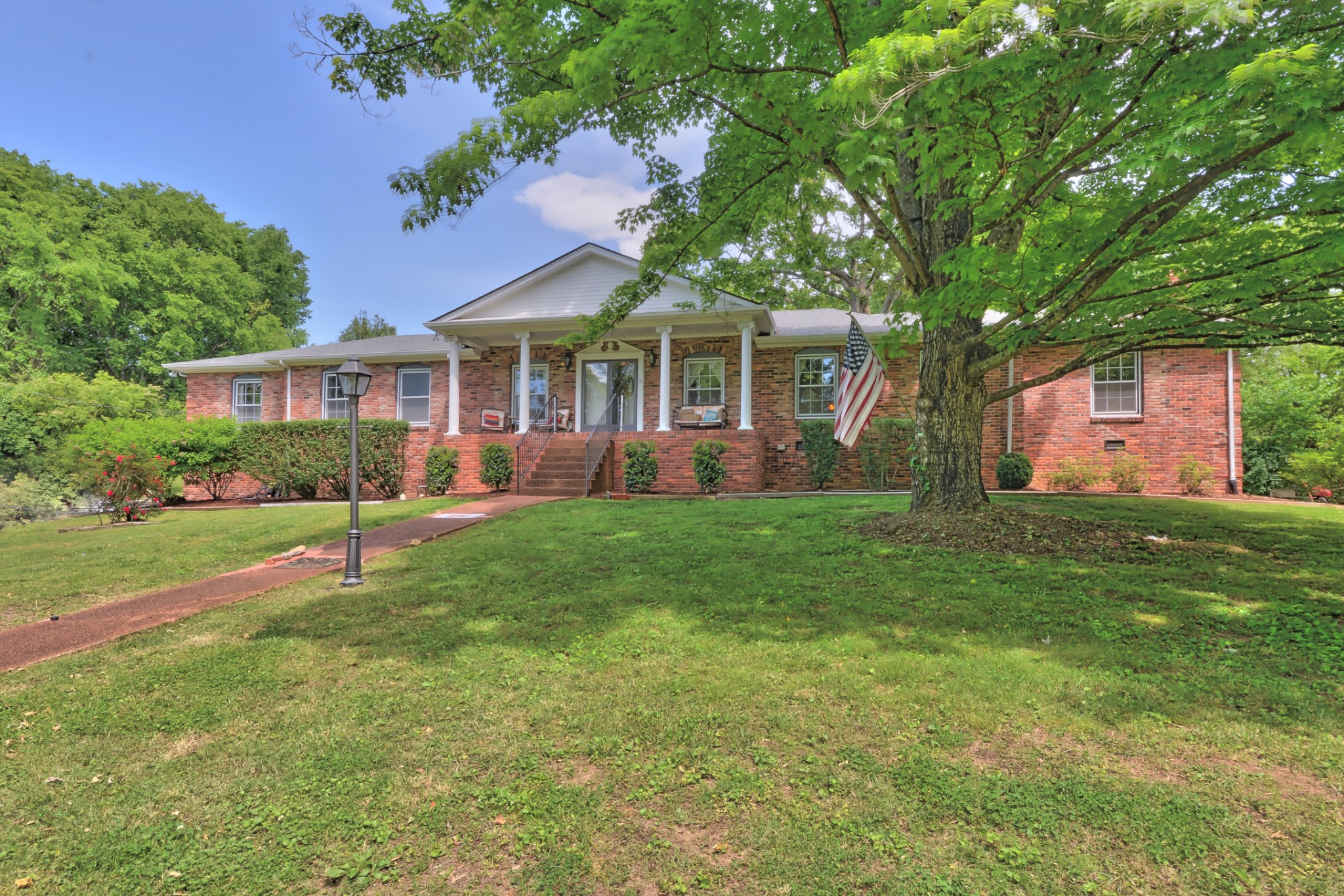 463 Walton Ferry Road Hendersonville, TN 37075 - Photo 2 of 37 front view of a house with a yard