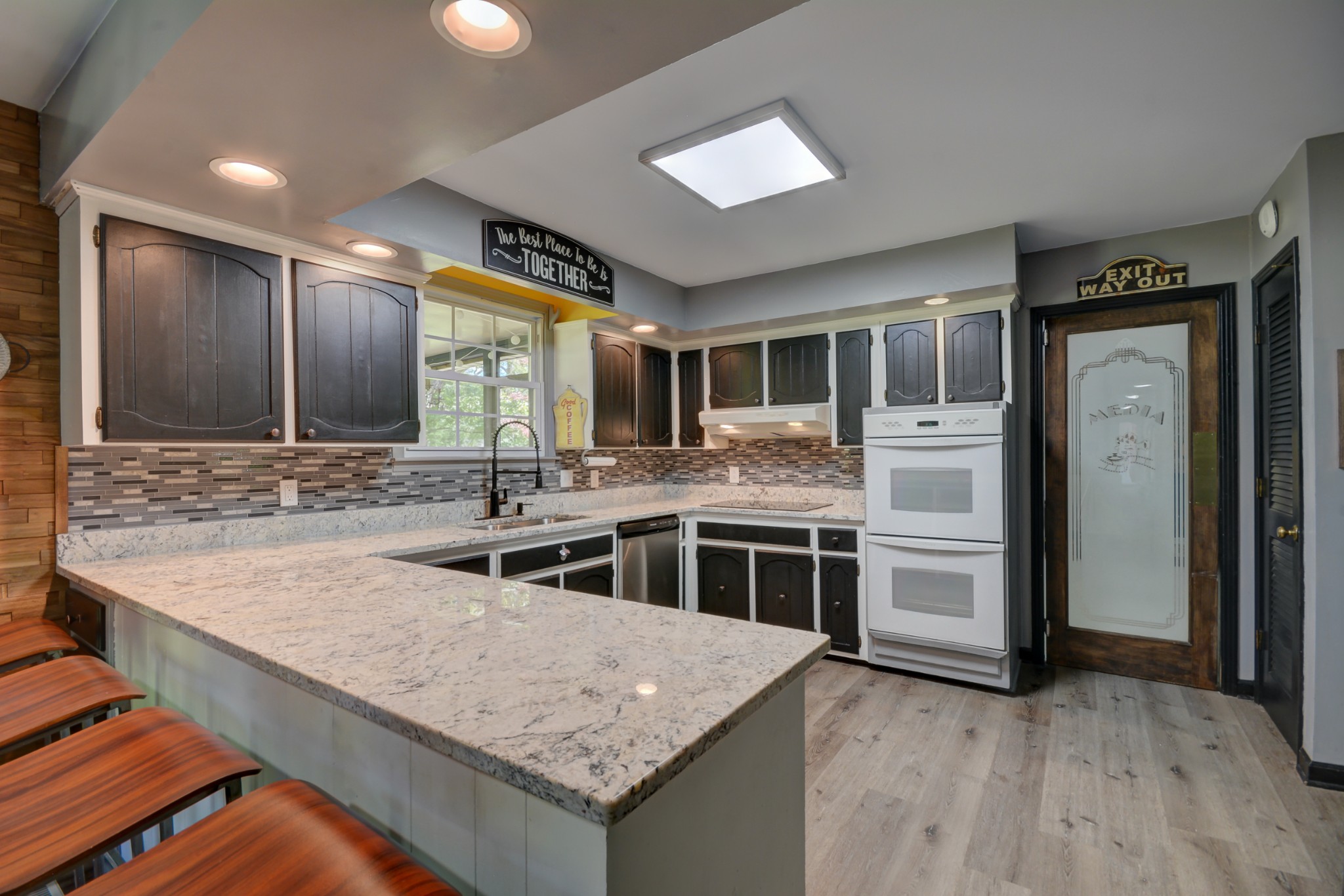 463 Walton Ferry Road Hendersonville, TN 37075 - Photo 13 of 37 a kitchen with stainless steel appliances granite countertop a sink and a refrigerator