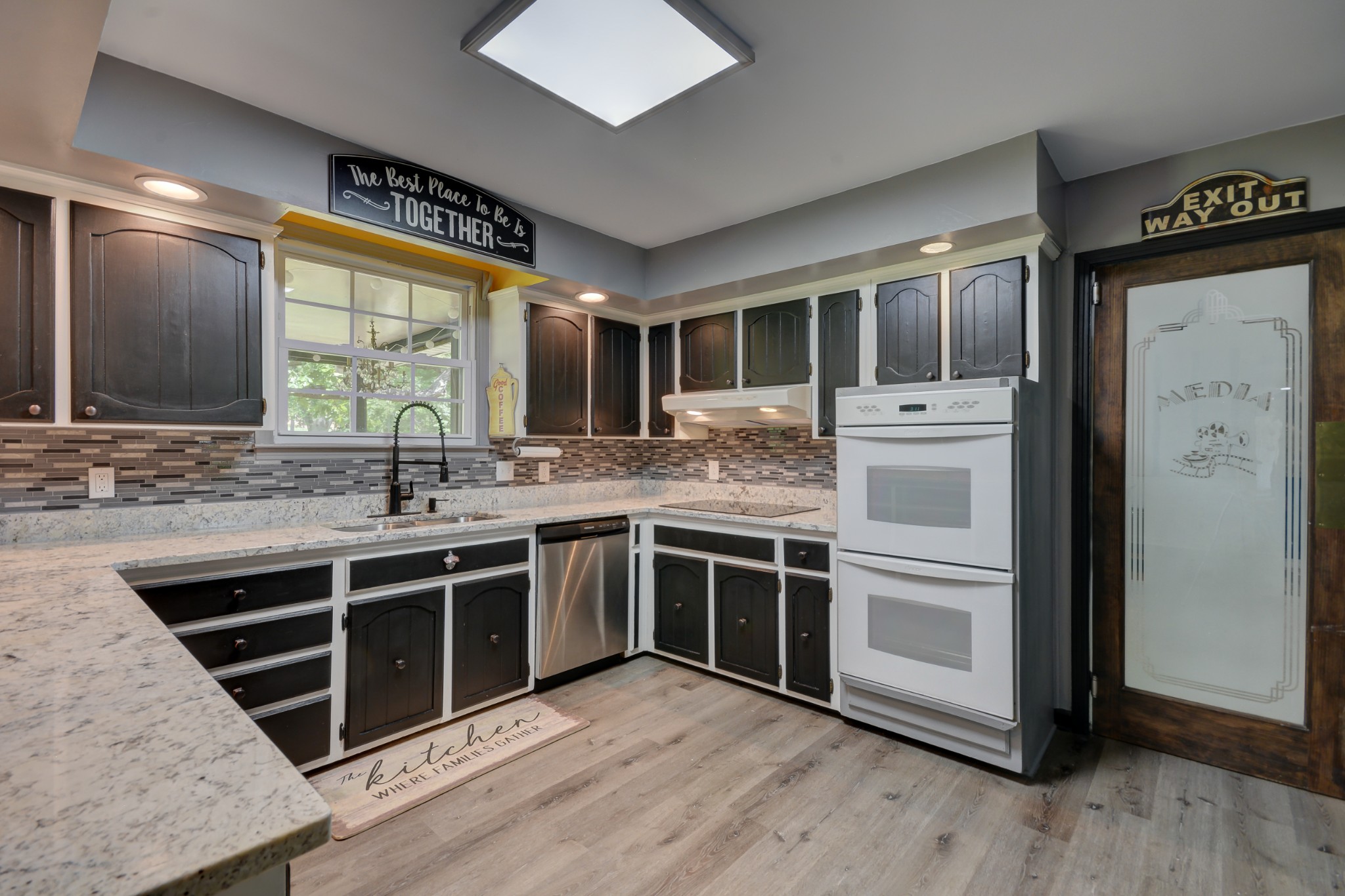 463 Walton Ferry Road Hendersonville, TN 37075 - Photo 15 of 37 a kitchen with stainless steel appliances granite countertop a stove and a sink