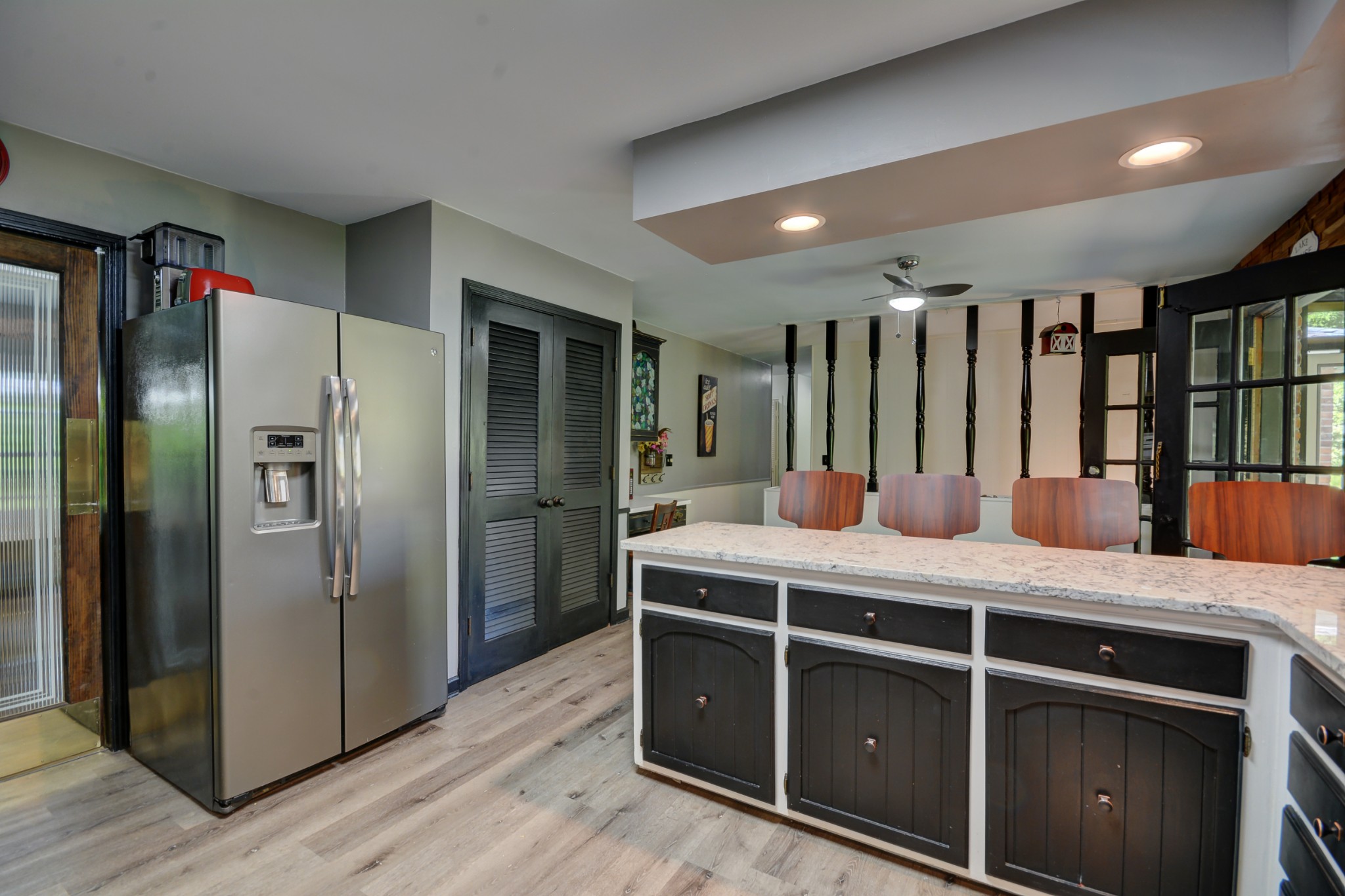 463 Walton Ferry Road Hendersonville, TN 37075 - Photo 16 of 37 a kitchen with kitchen island granite countertop a refrigerator and a sink