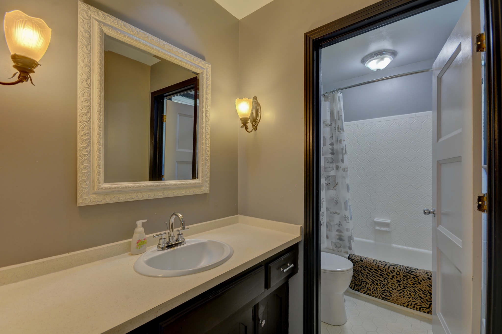 463 Walton Ferry Road Hendersonville, TN 37075 - Photo 20 of 37 a bathroom with a sink and a mirror