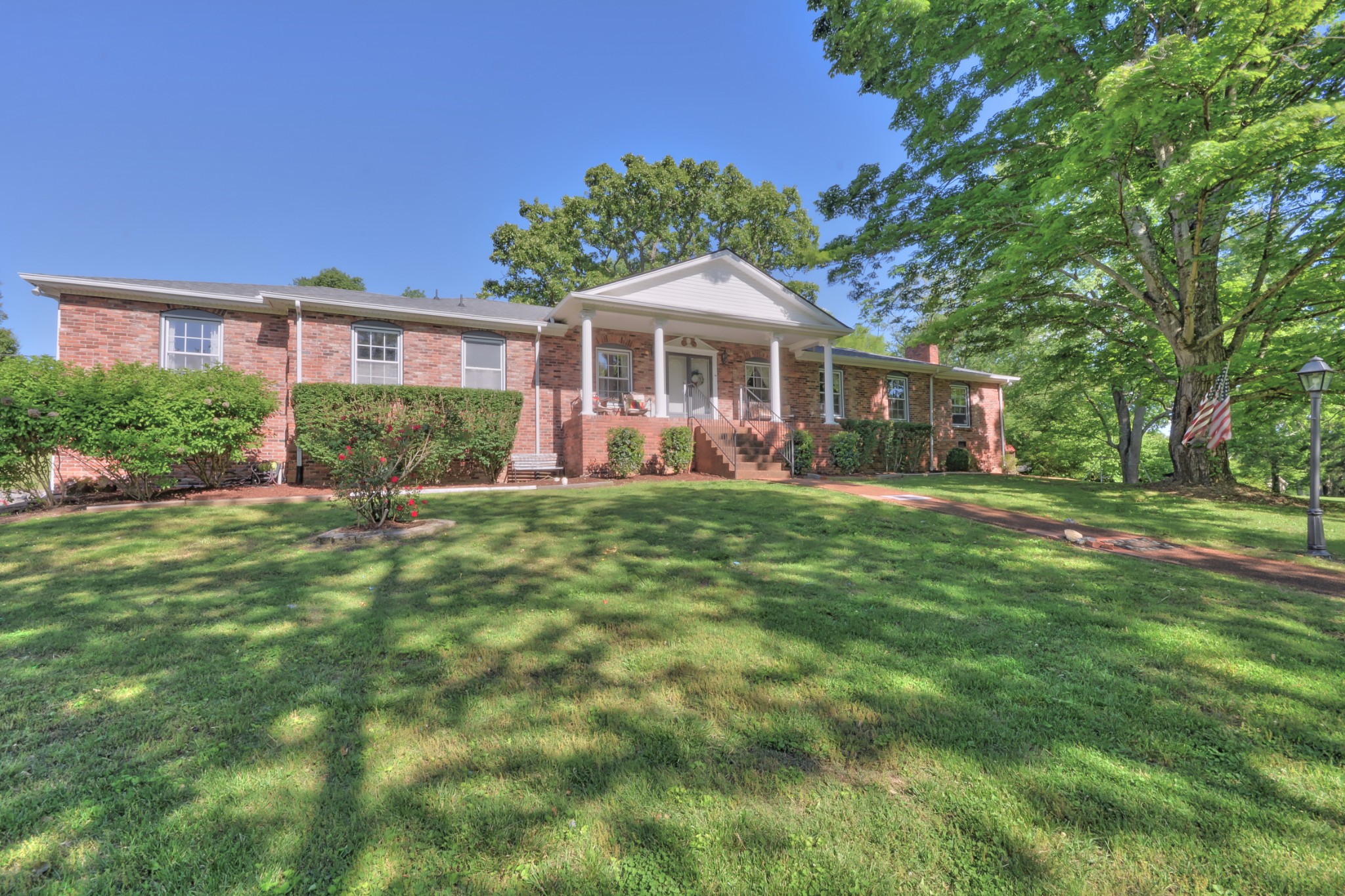 463 Walton Ferry Road Hendersonville, TN 37075 - Photo 3 of 37 a front view of a house with a yard