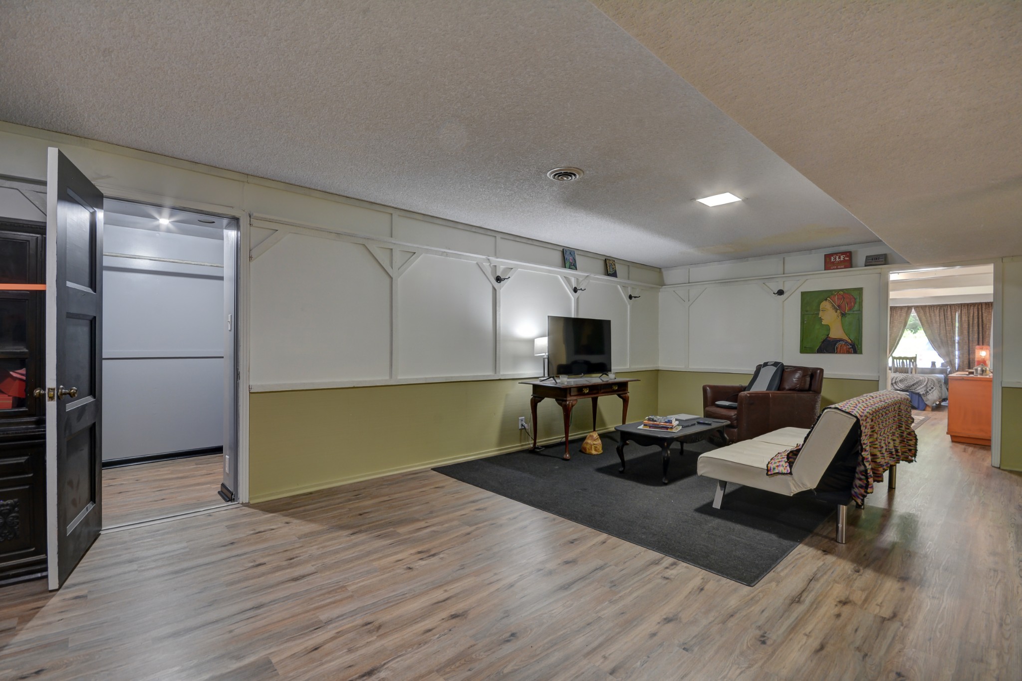 463 Walton Ferry Road Hendersonville, TN 37075 - Photo 24 of 37 a living room with furniture wooden floor and a view of kitchen