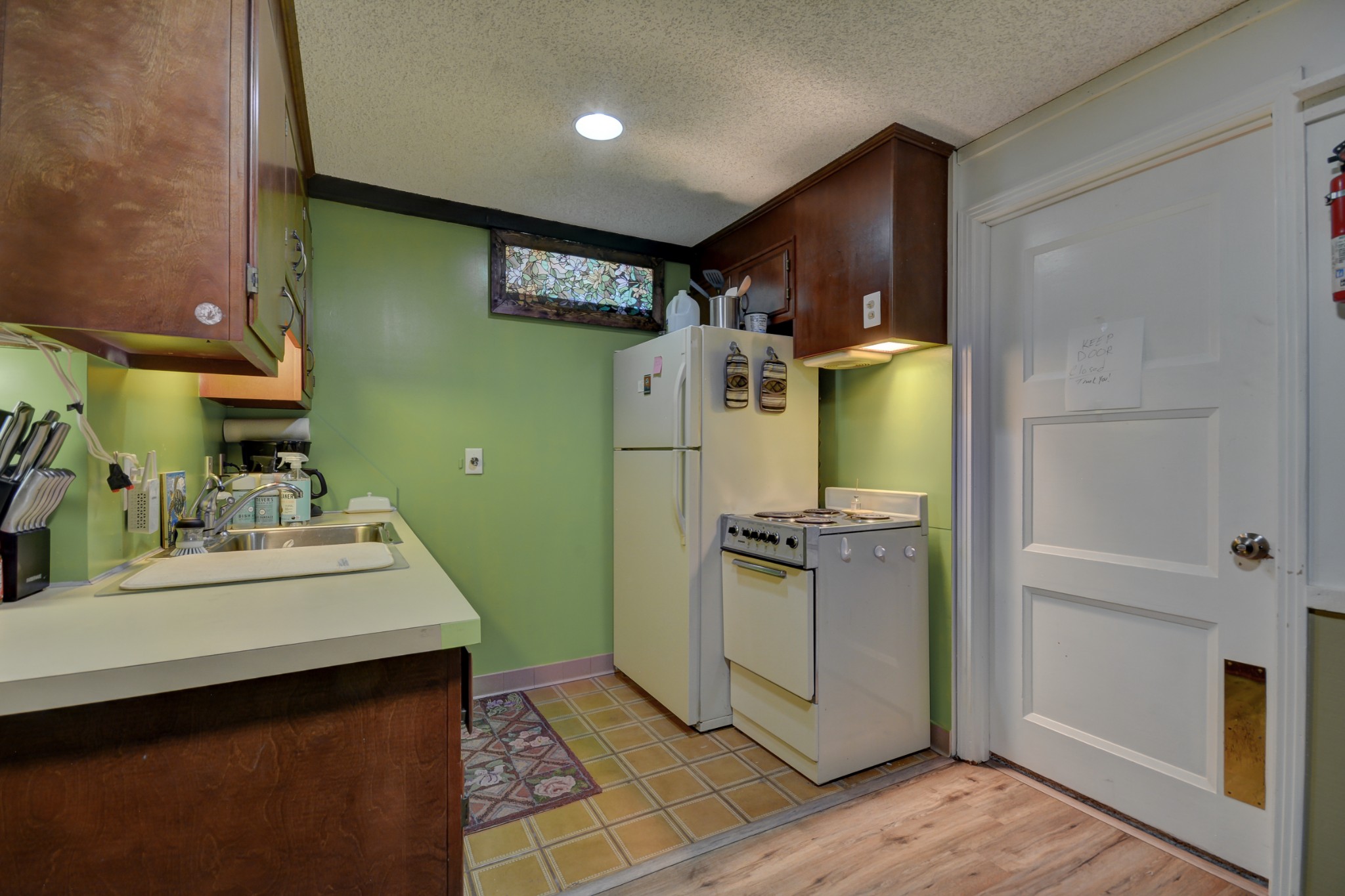 463 Walton Ferry Road Hendersonville, TN 37075 - Photo 26 of 37 a kitchen with a refrigerator sink and stove