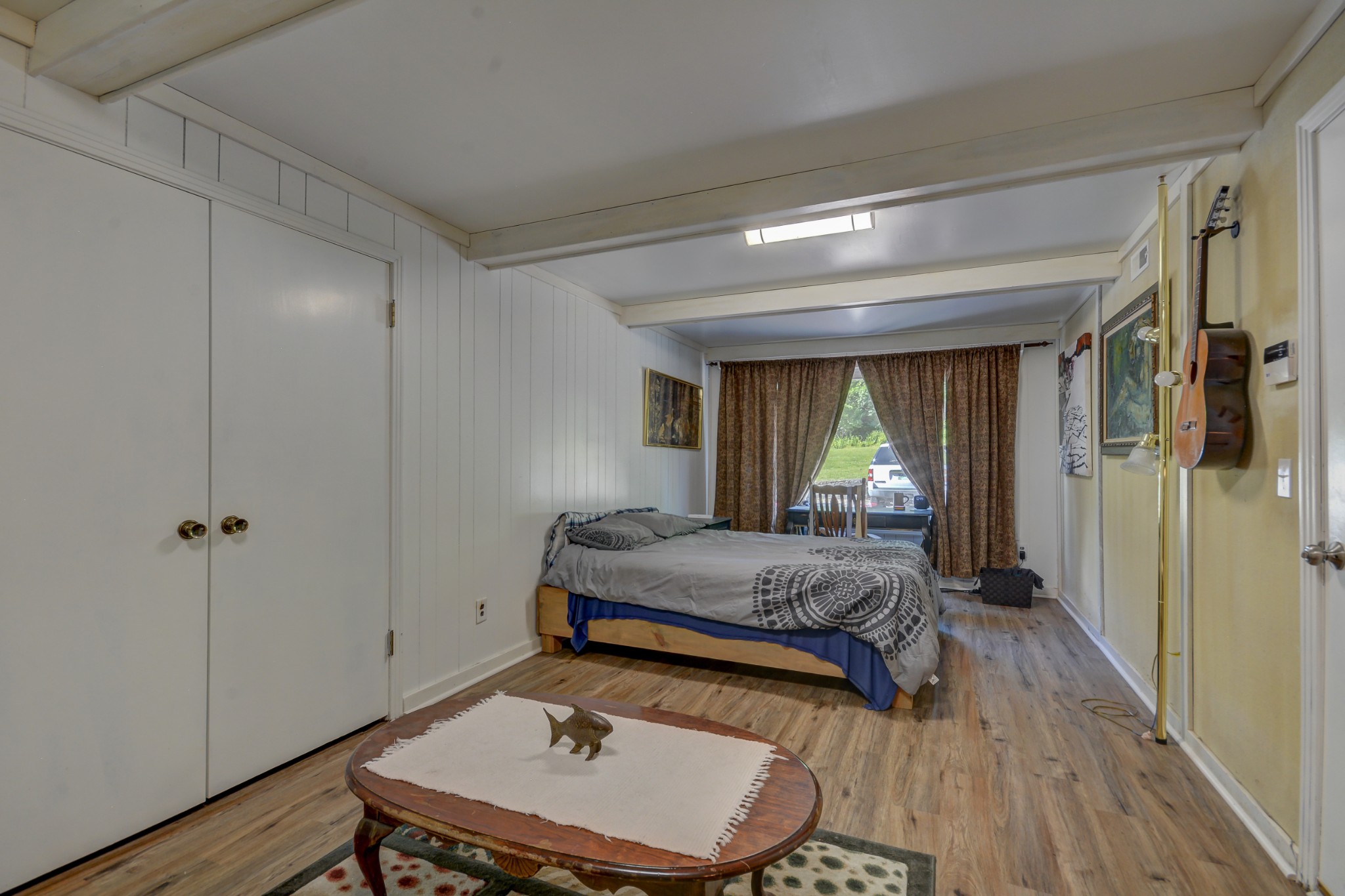 463 Walton Ferry Road Hendersonville, TN 37075 - Photo 27 of 37 a bedroom with a bed and wooden floor