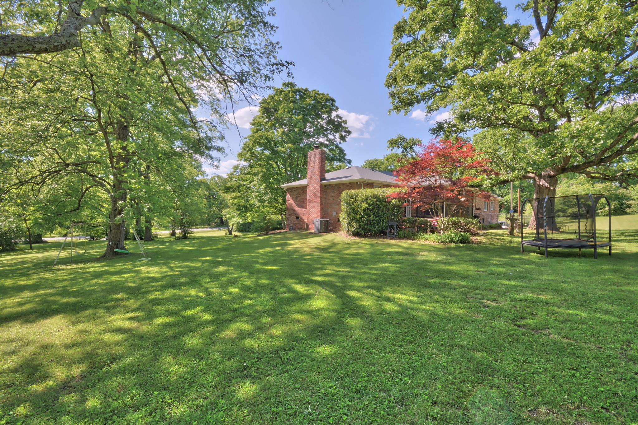 463 Walton Ferry Road Hendersonville, TN 37075 - Photo 34 of 37 a front view of a house with a garden