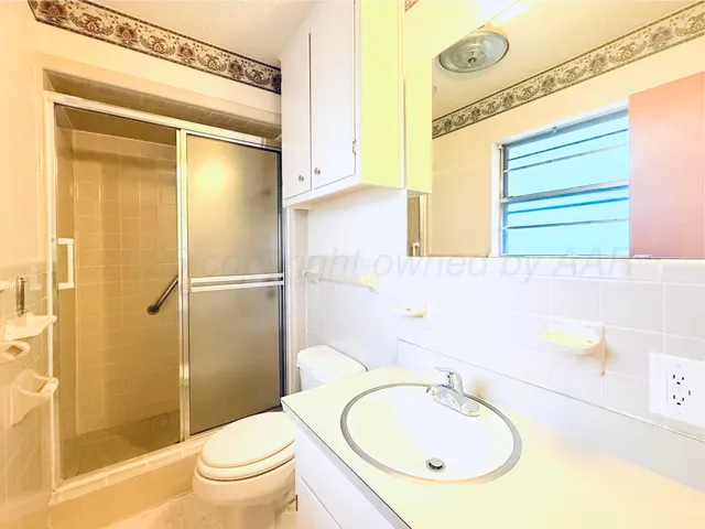 a view of balcony with furniture