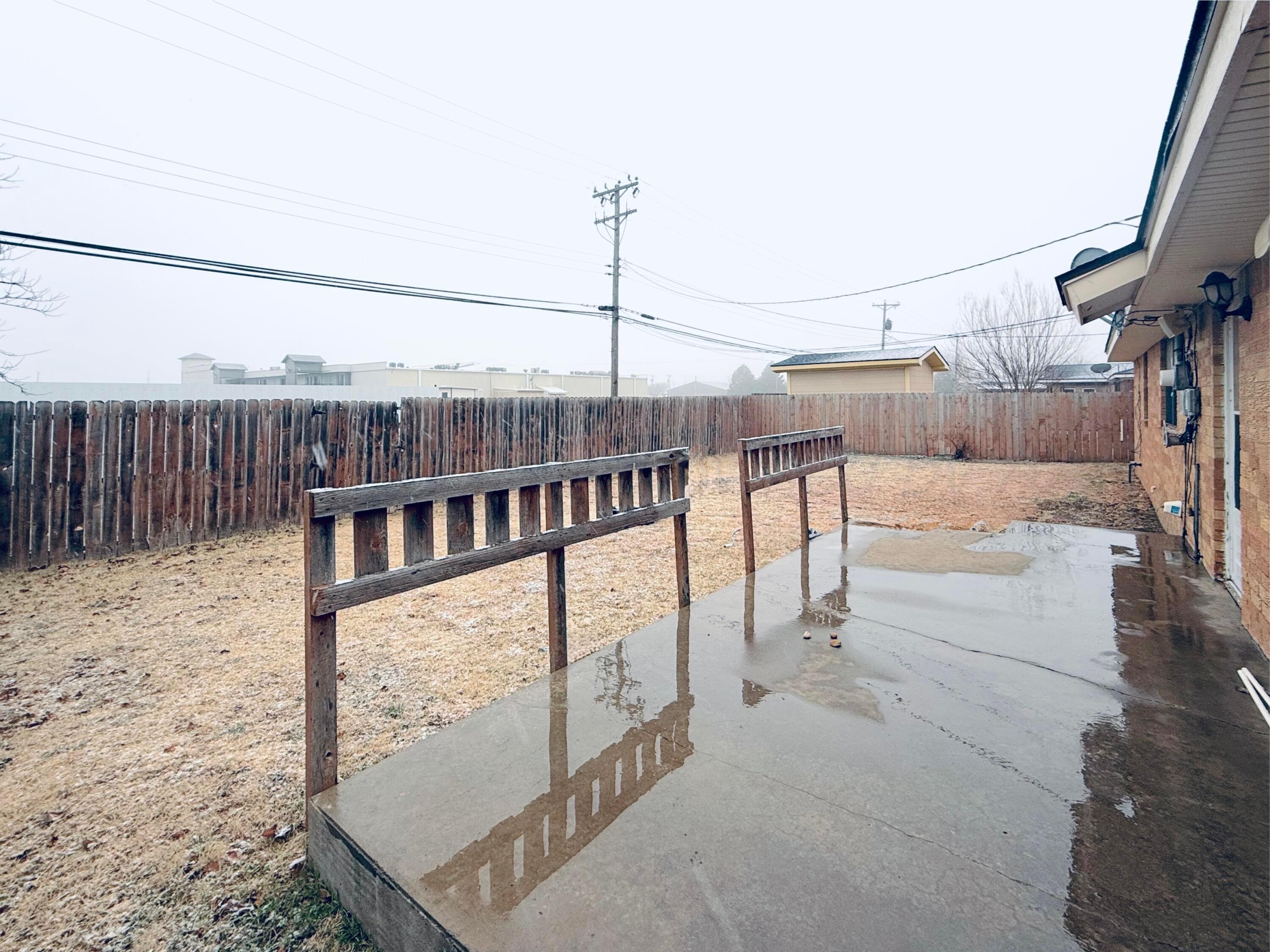 1713 Sunset Avenue Dumas, TX 79029 - Photo 14 of 15 a view of balcony with furniture