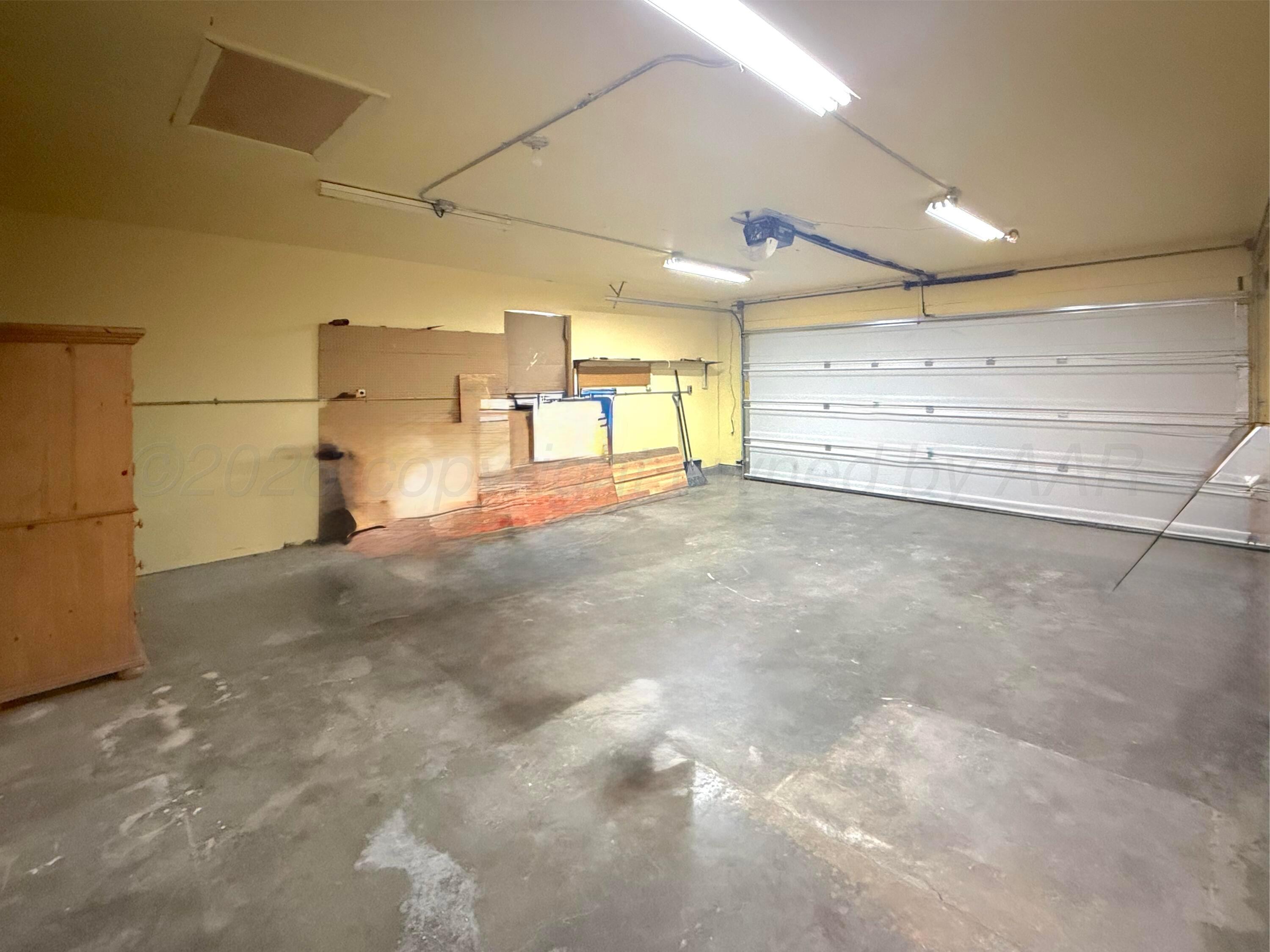 1713 Sunset Avenue Dumas, TX 79029 - Photo 15 of 15 a view of a garage