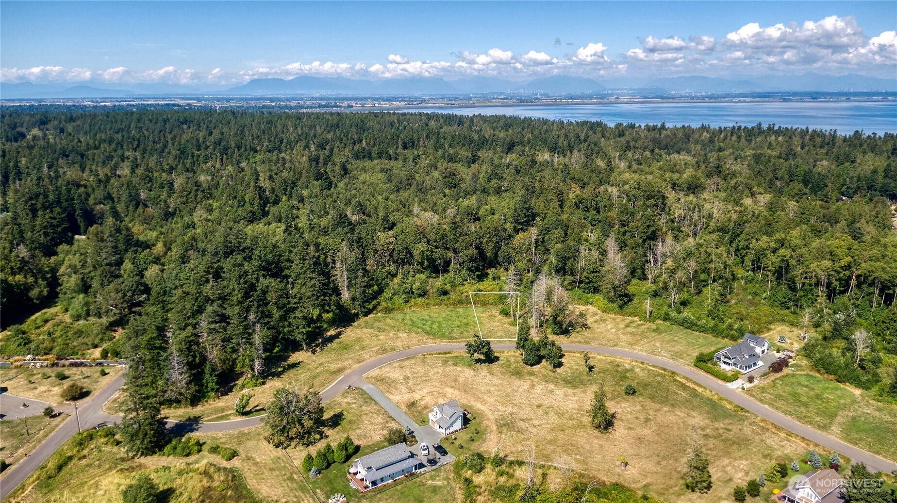 2128 Seabright Loop Point Roberts, WA 98281 - Photo 11 of 13 a view of a swimming pool with a yard
