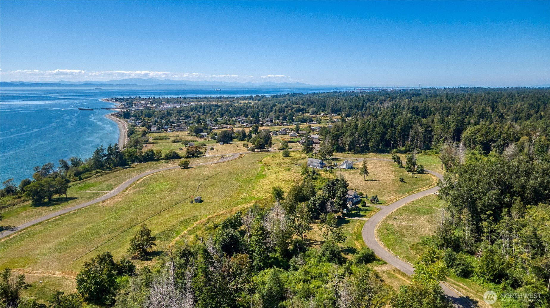 2128 Seabright Loop Point Roberts, WA 98281 - Photo 6 of 13 an aerial view of a house with a yard