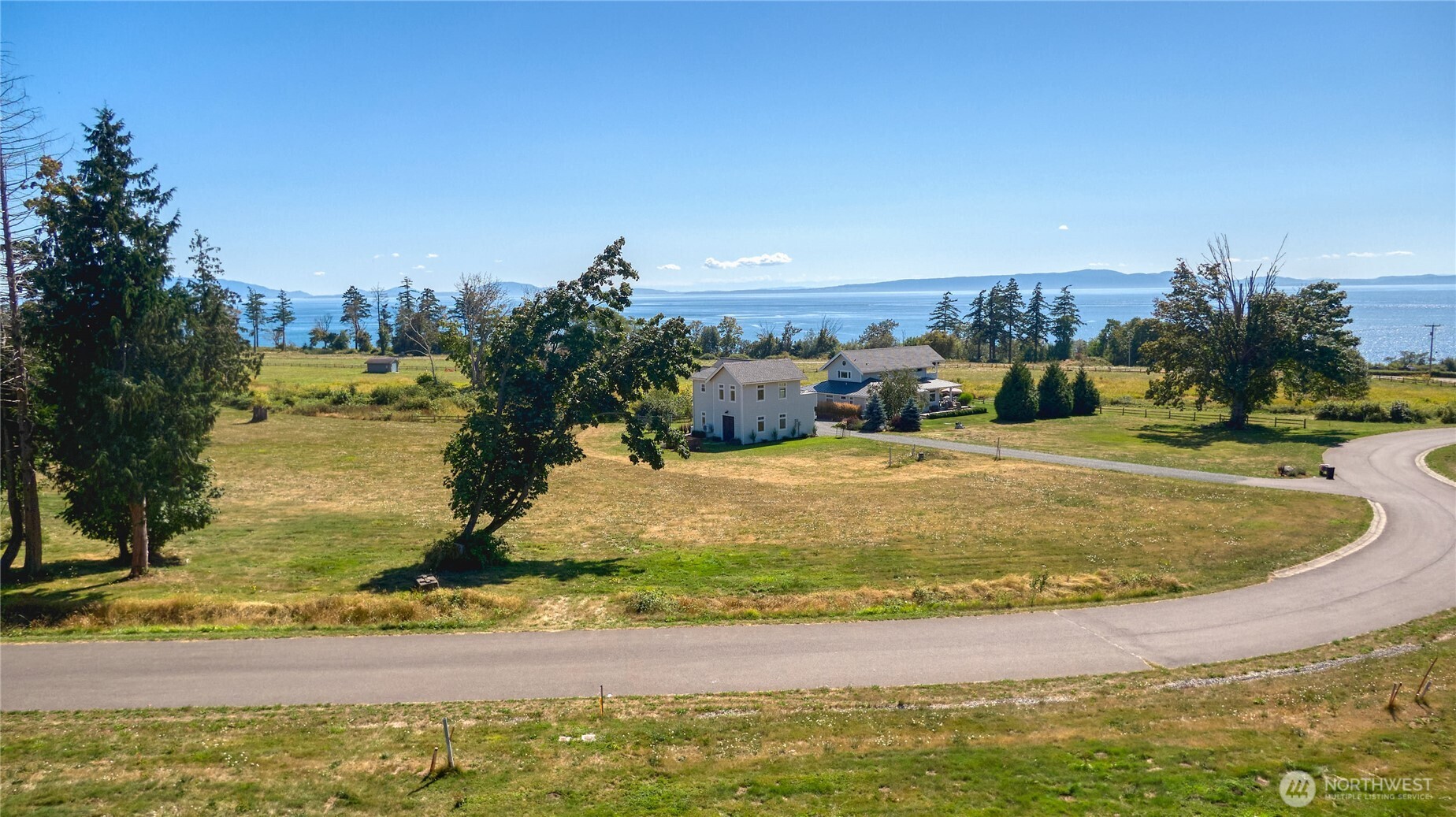 2128 Seabright Loop Point Roberts, WA 98281 - Photo 10 of 13 a view of a swimming pool with an ocean view