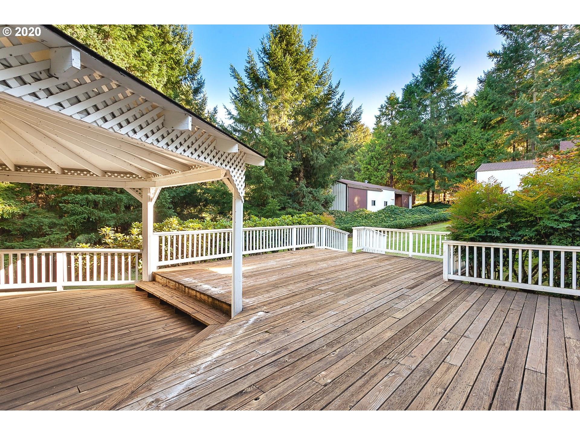 18740 Southwest Seiffert Road Sherwood, OR 97140 - Photo 22 of 32 a view of deck with patio and wooden floor