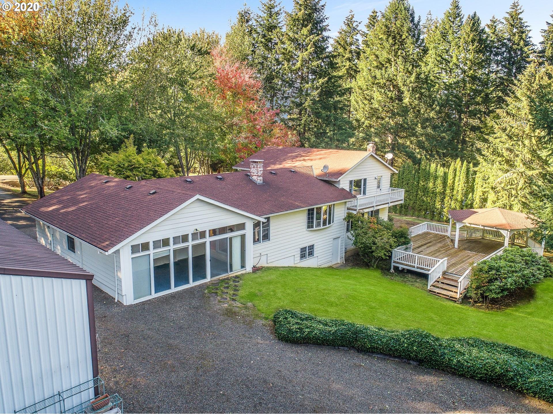 18740 Southwest Seiffert Road Sherwood, OR 97140 - Photo 30 of 32 a aerial view of a house with a yard table and chairs