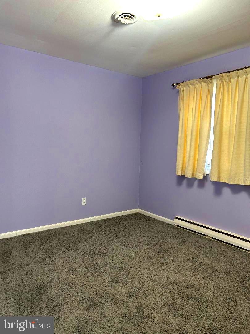 304 Barksdale Road Joppa, MD 21085 - Photo 17 of 24 a view of an empty room with a window