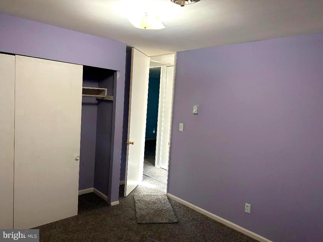 304 Barksdale Road Joppa, MD 21085 - Photo 18 of 24 a view of a hallway with wooden shelves