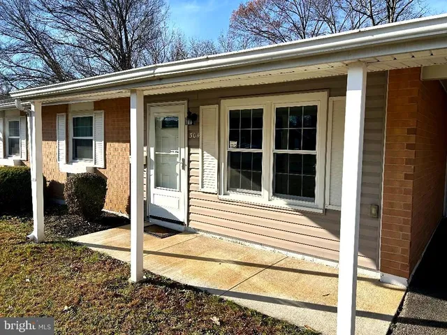 a view of house with a large window