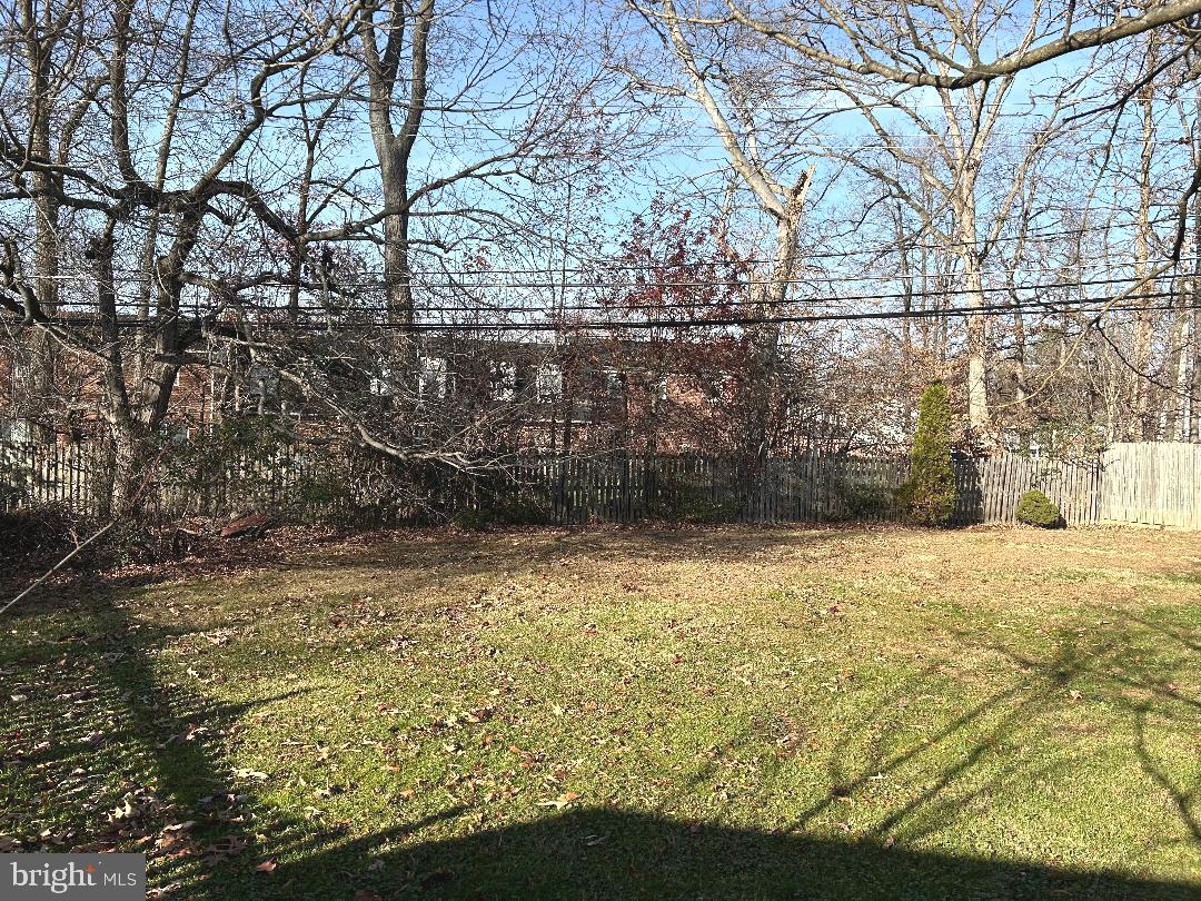 304 Barksdale Road Joppa, MD 21085 - Photo 9 of 24 a view of empty yard with large trees