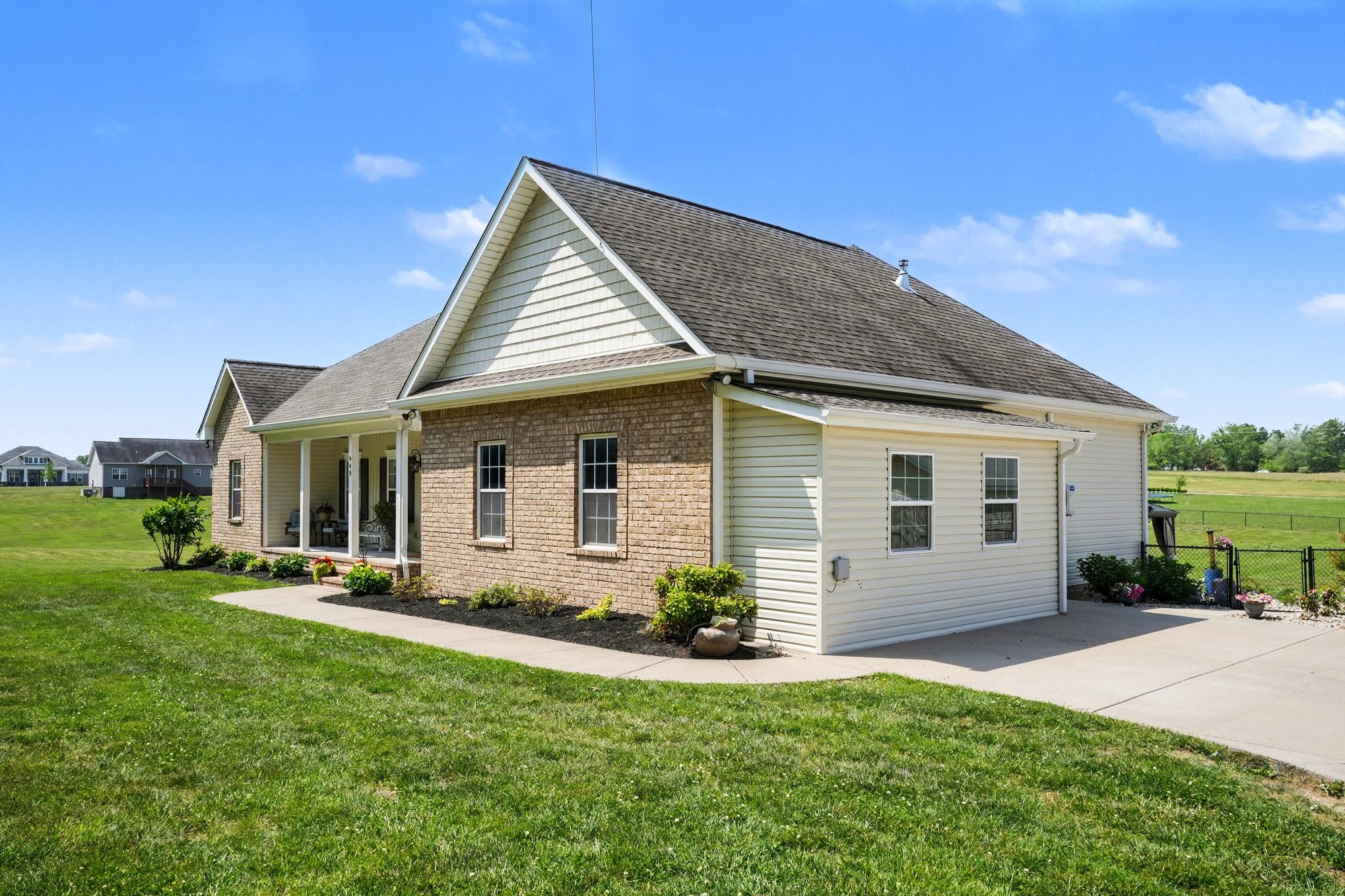 948 Goslin Branch Road Burns, TN 37029 - Photo 2 of 37 a front view of house with yard and green space