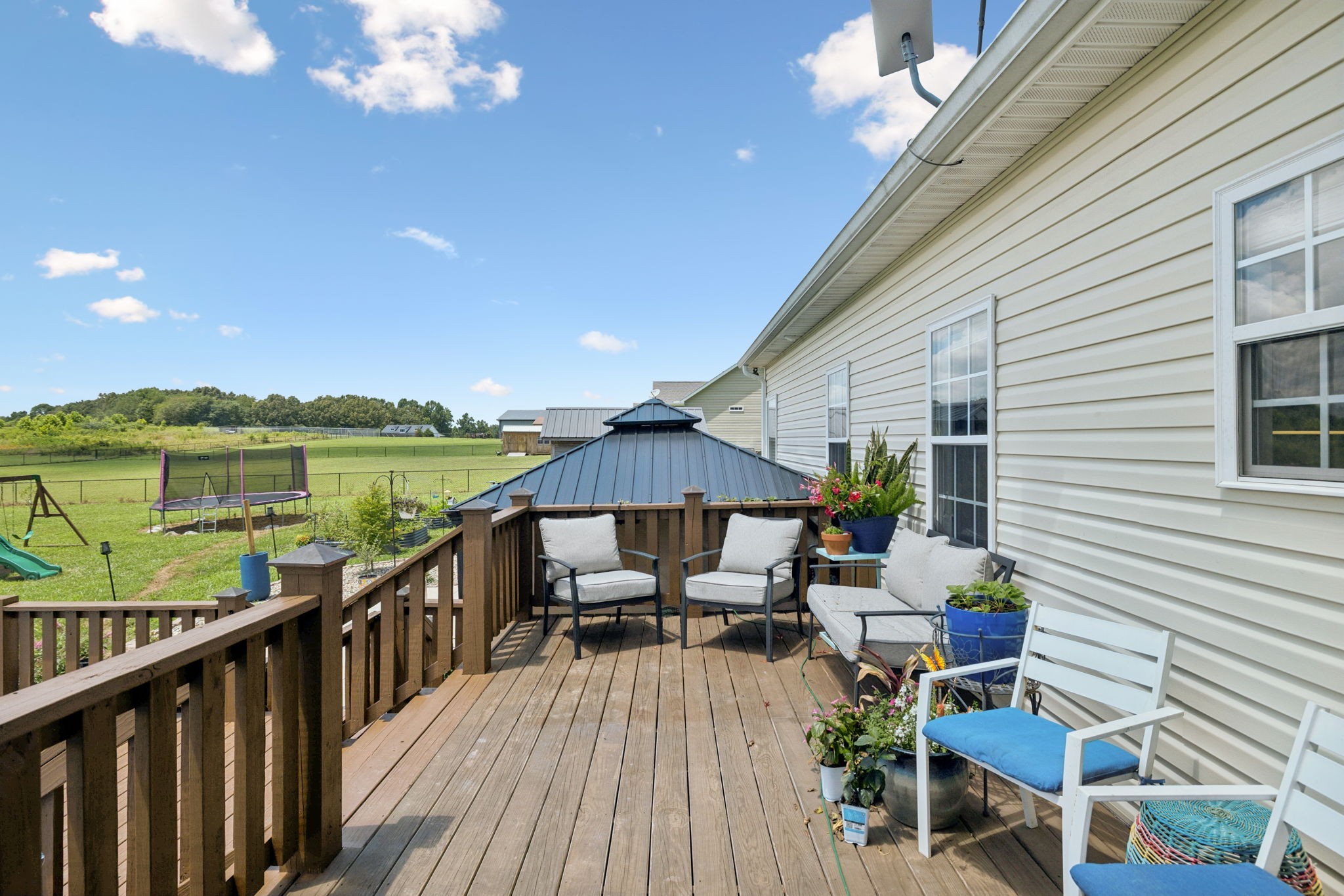 948 Goslin Branch Road Burns, TN 37029 - Photo 21 of 37 a house view with a seating space and a balcony