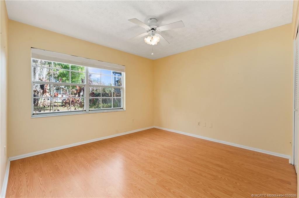 2493 Southwest Murphy Road Palm City, FL 34990 - Photo 14 of 50 a view of an empty room with a window