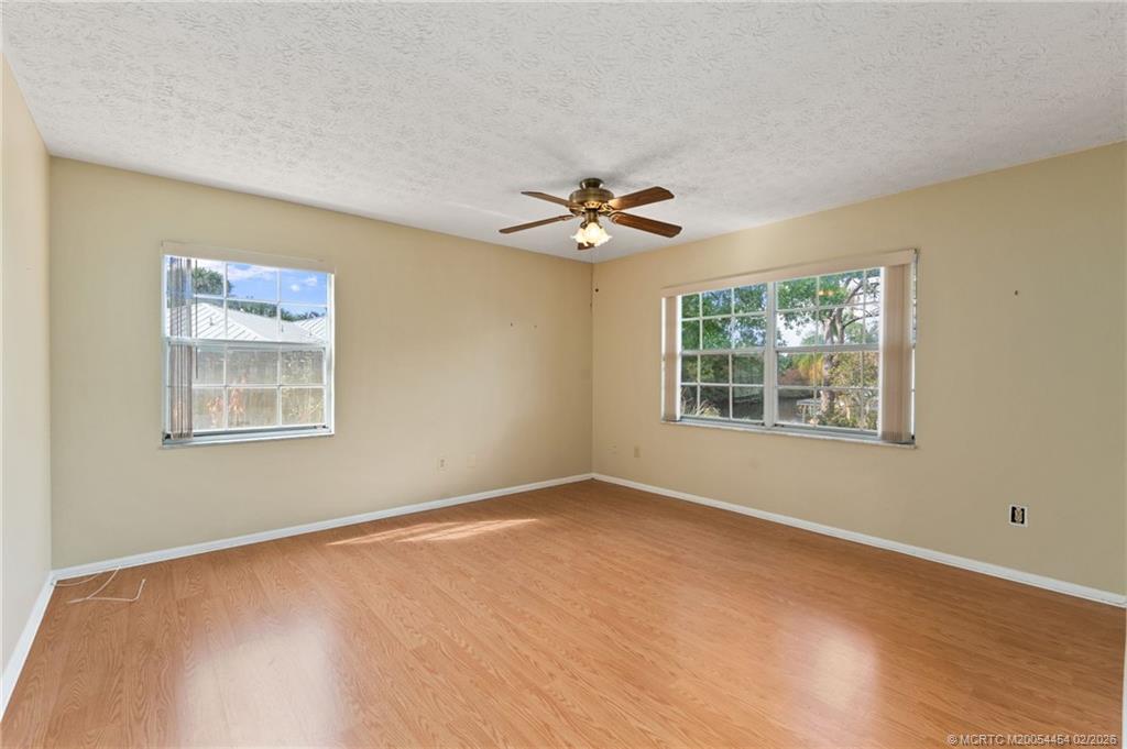 2493 Southwest Murphy Road Palm City, FL 34990 - Photo 25 of 50 a view of an empty room with a window